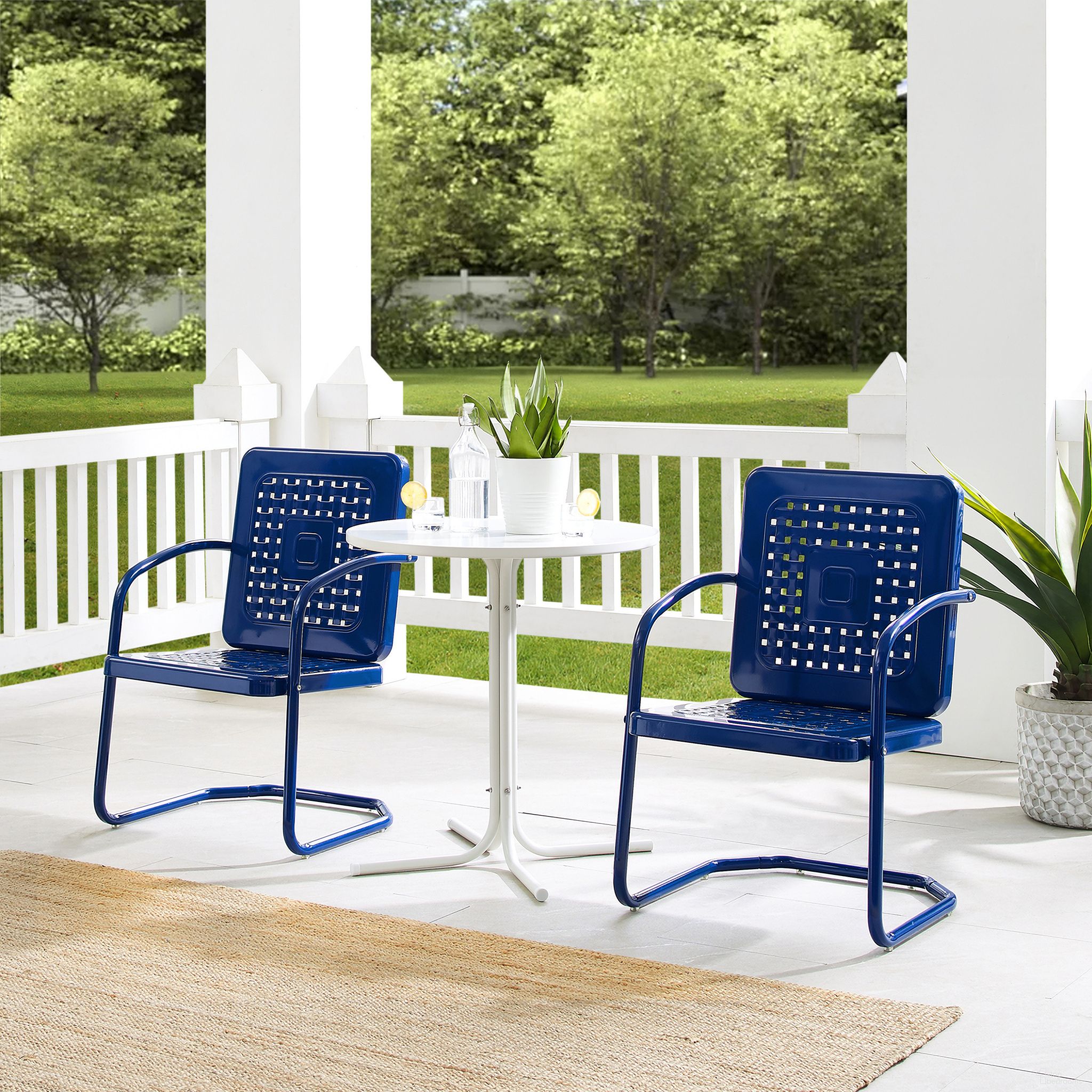 The appearance of Bates 3 Piece Retro Outdoor Bistro Set In Navy Gloss and White Satin designed by Crosley Brands in the transitional interior design. This navy piece of furniture was selected by 1StopBedrooms from Bates Collection to add a touch of cosiness and style into your home. Sku: CO1025-NV;CO1014-WH. Material: Steel.