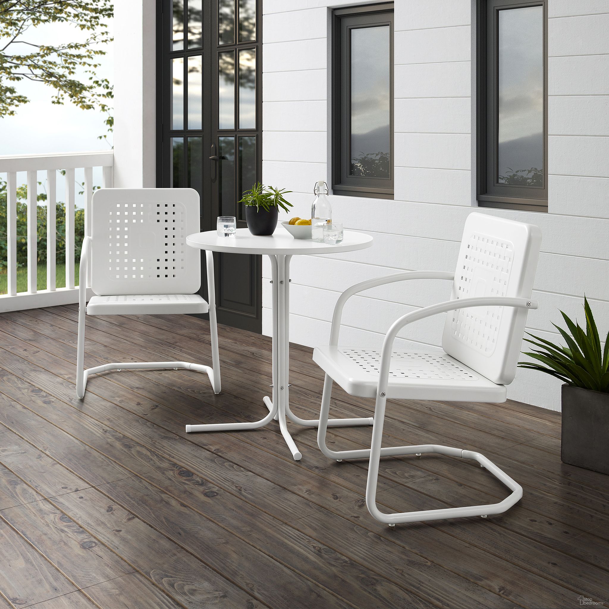 The appearance of Bates 3 Piece Retro Outdoor Bistro Set In White Gloss and White Satin designed by Crosley Brands in the transitional interior design. This white gloss piece of furniture was selected by 1StopBedrooms from Bates Collection to add a touch of cosiness and style into your home. Sku: CO1025-WH;CO1014-WH. Material: Steel.