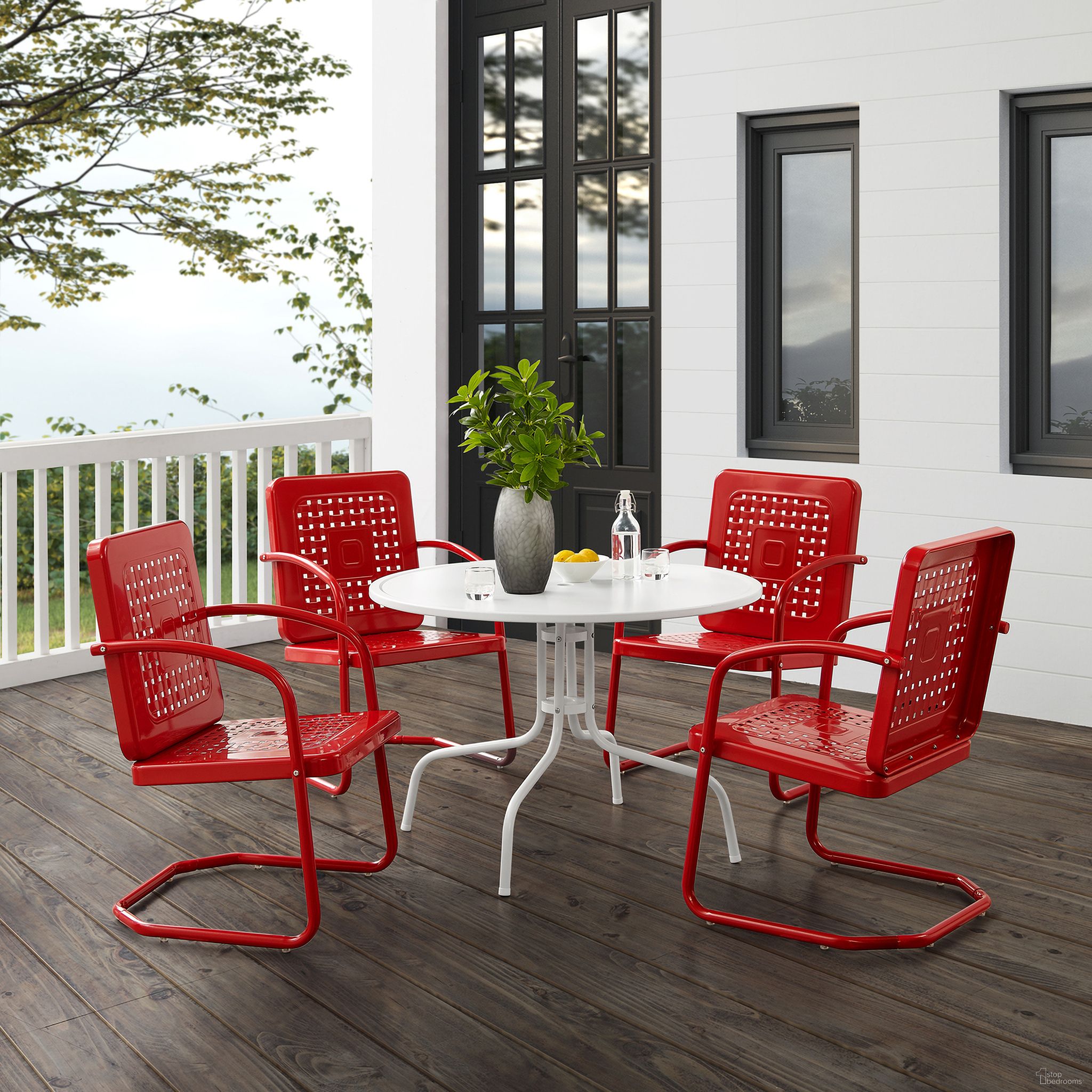The appearance of Bates 5 Piece Round Retro Outdoor Dining Set In Bright Red Gloss and White Satin designed by Crosley Brands in the transitional interior design. This red piece of furniture was selected by 1StopBedrooms from Bates Collection to add a touch of cosiness and style into your home. Sku: CO1012A-WH;CO1025-RE;CO1025-RE. Material: Steel.