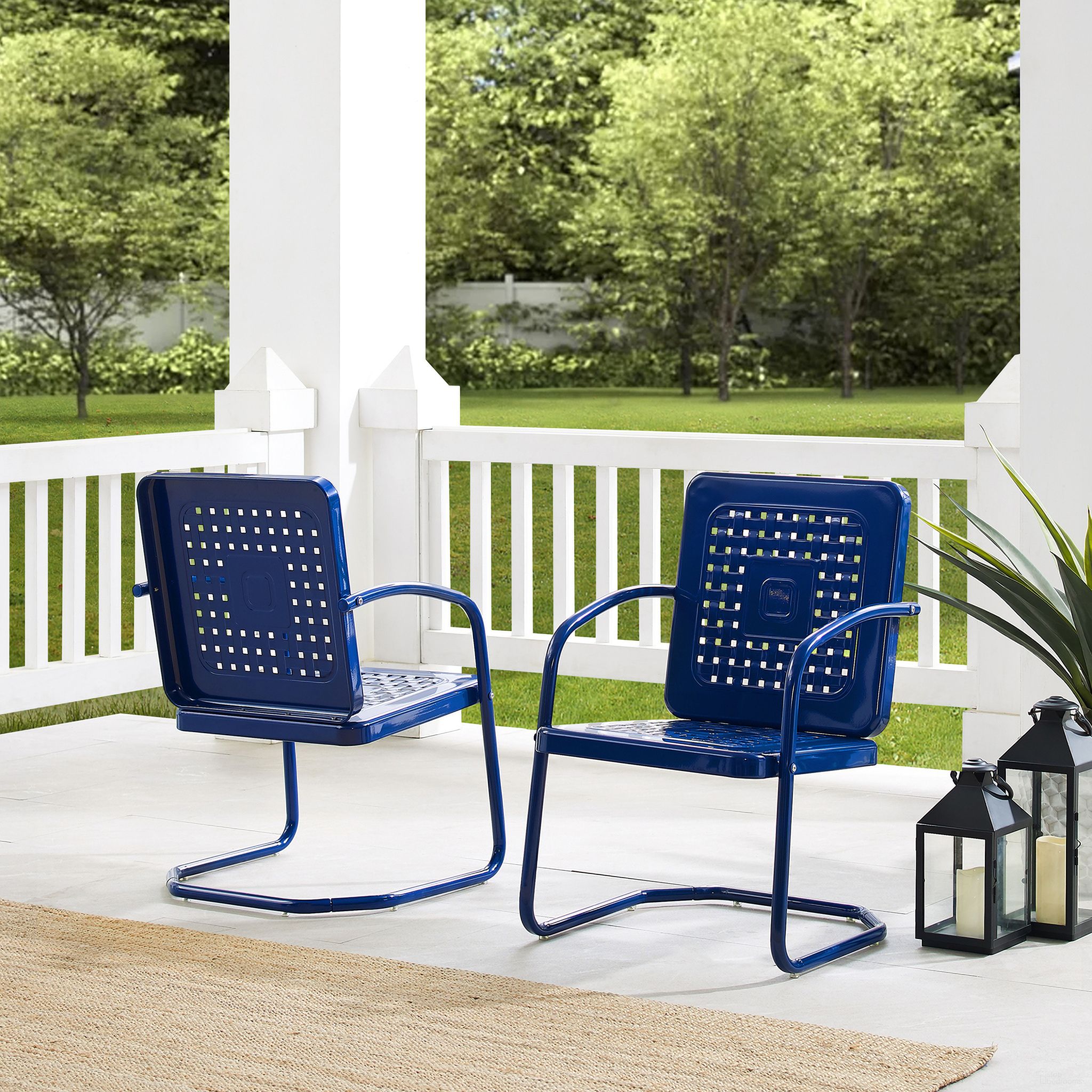 The appearance of Bates Retro Outdoor Chair In Navy Gloss - Set of 2 designed by Crosley Brands in the transitional interior design. This navy piece of furniture was selected by 1StopBedrooms from Bates Collection to add a touch of cosiness and style into your home. Sku: CO1025-NV. Material: Steel.