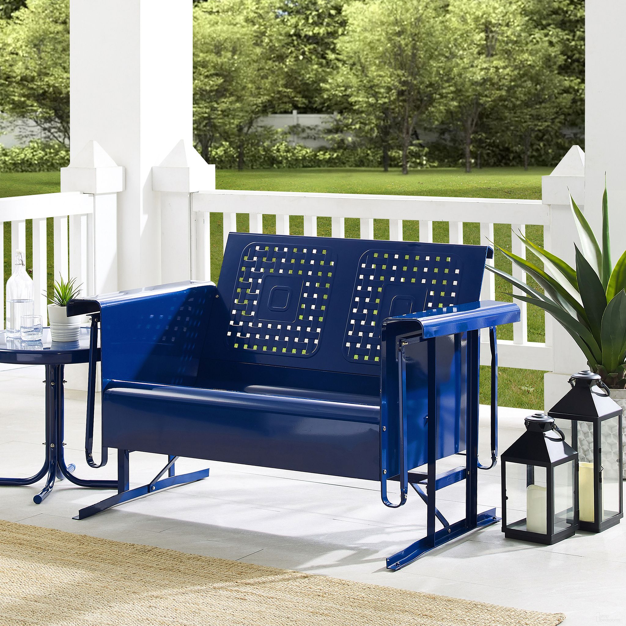 The appearance of Bates Retro Outdoor Loveseat Glider In Navy Gloss designed by Crosley Brands in the transitional interior design. This navy piece of furniture was selected by 1StopBedrooms from Bates Collection to add a touch of cosiness and style into your home. Sku: CO1024-NV. Material: Steel.