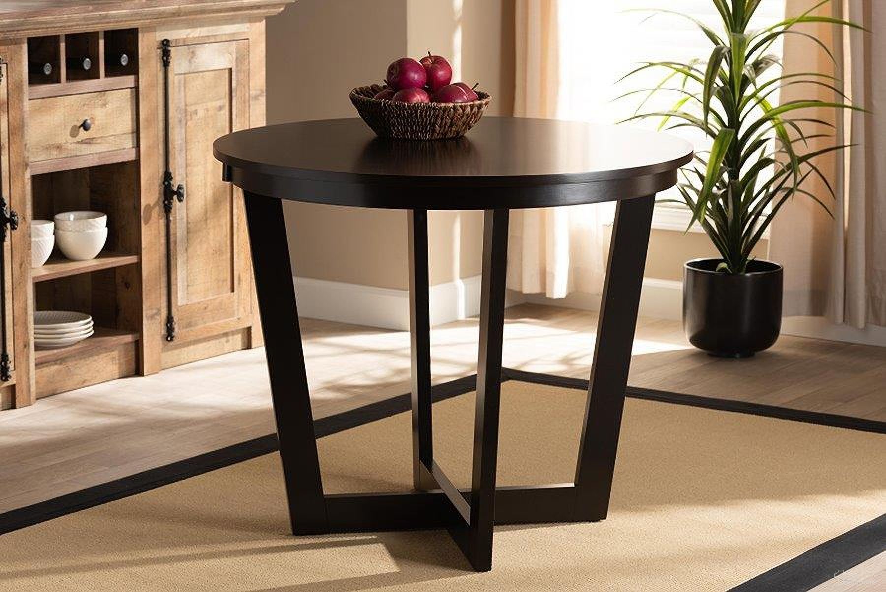 The appearance of Baxton Studio Alayna Modern and Contemporary Dark Brown Finished 35-Inch-Wide Round Wood Dining Table designed by Baxton Studio in the modern / contemporary interior design. This dark brown piece of furniture  was selected by 1StopBedrooms from Alayna Collection to add a touch of cosiness and style into your home. Sku: RH7048T-Dark Brown-35-IN-DT. Table Base Style: Pedestal. Table Top Shape: Round. Material: MDF. Size: 35".