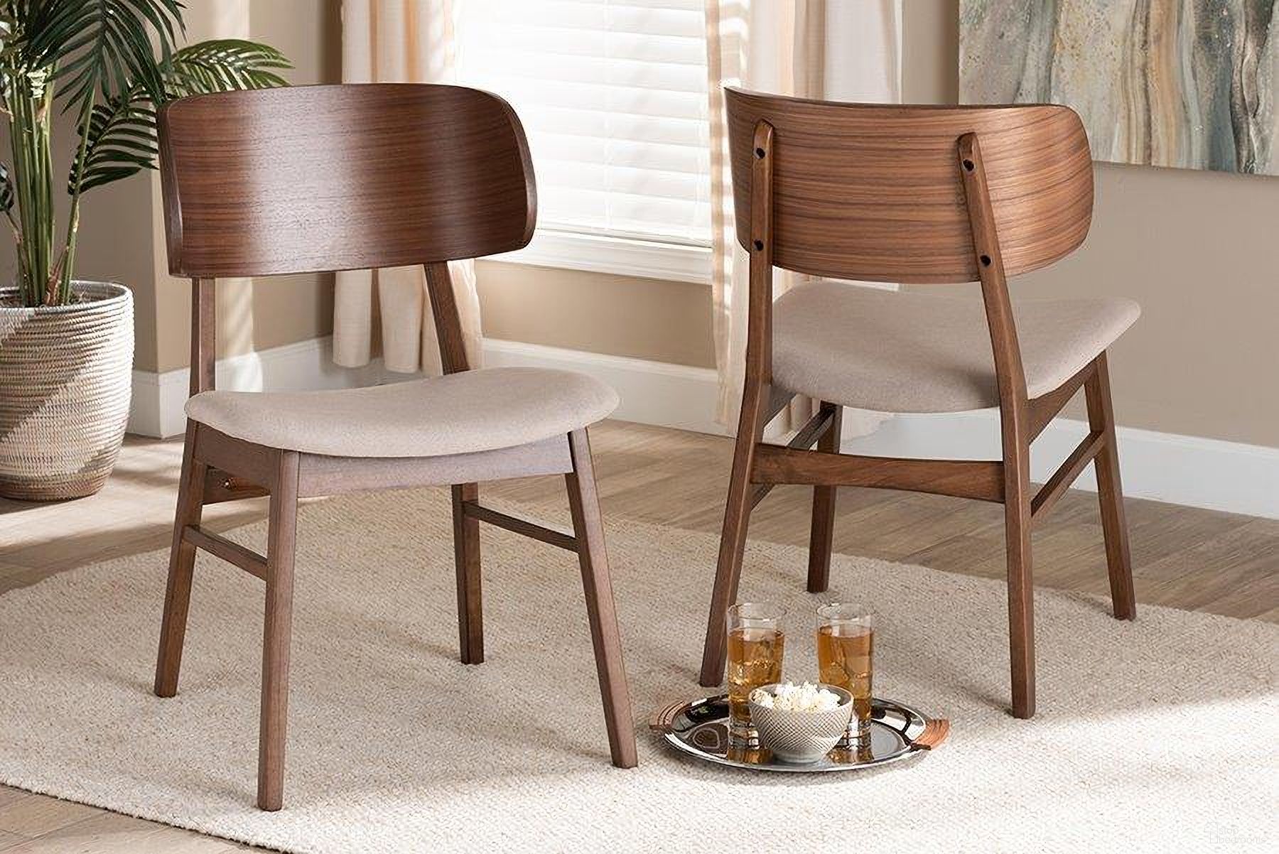 The appearance of Baxton Studio Alston Mid-Century Modern Beige Fabric Upholstered and Walnut Brown Finished Wood 2-Piece Dining Chair Set designed by Baxton Studio in the transitional interior design. This walnut and beige piece of furniture was selected by 1StopBedrooms from Alston Collection to add a touch of cosiness and style into your home. Sku: WM1892B-Latte/Walnut-DC. Material: Rubberwood. Chair Type: Side Chair.