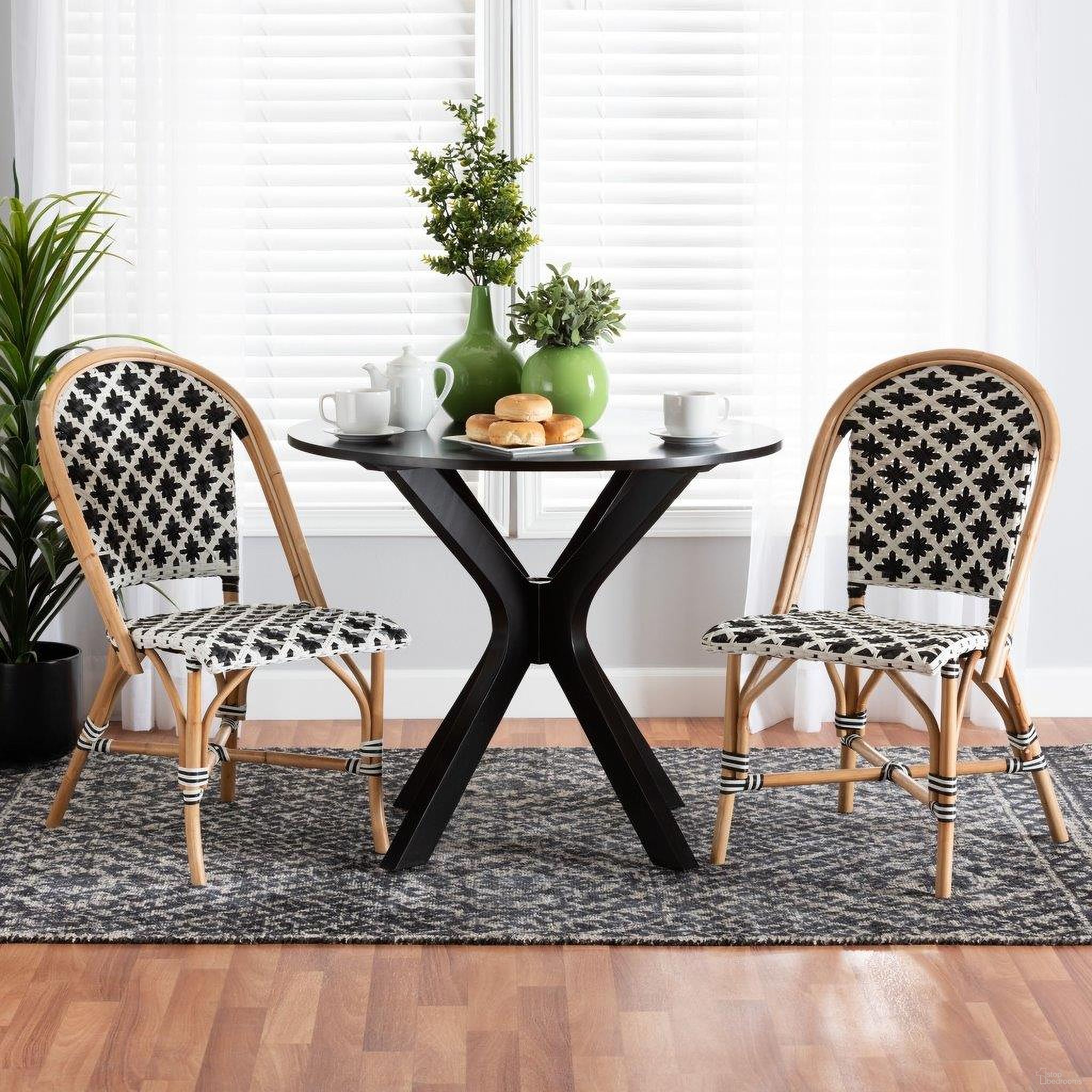 The appearance of Baxton Studio Ambre Modern French Black And White Weaving Natural Rattan 2-Piece Bistro Chair Set designed by Baxton Studio in the transitional interior design. This black/white piece of furniture was selected by 1StopBedrooms from Ambre Collection to add a touch of cosiness and style into your home. Sku: BC003-Rattan-DC. Material: Natural Rattan. Chair Type: Side Chair.