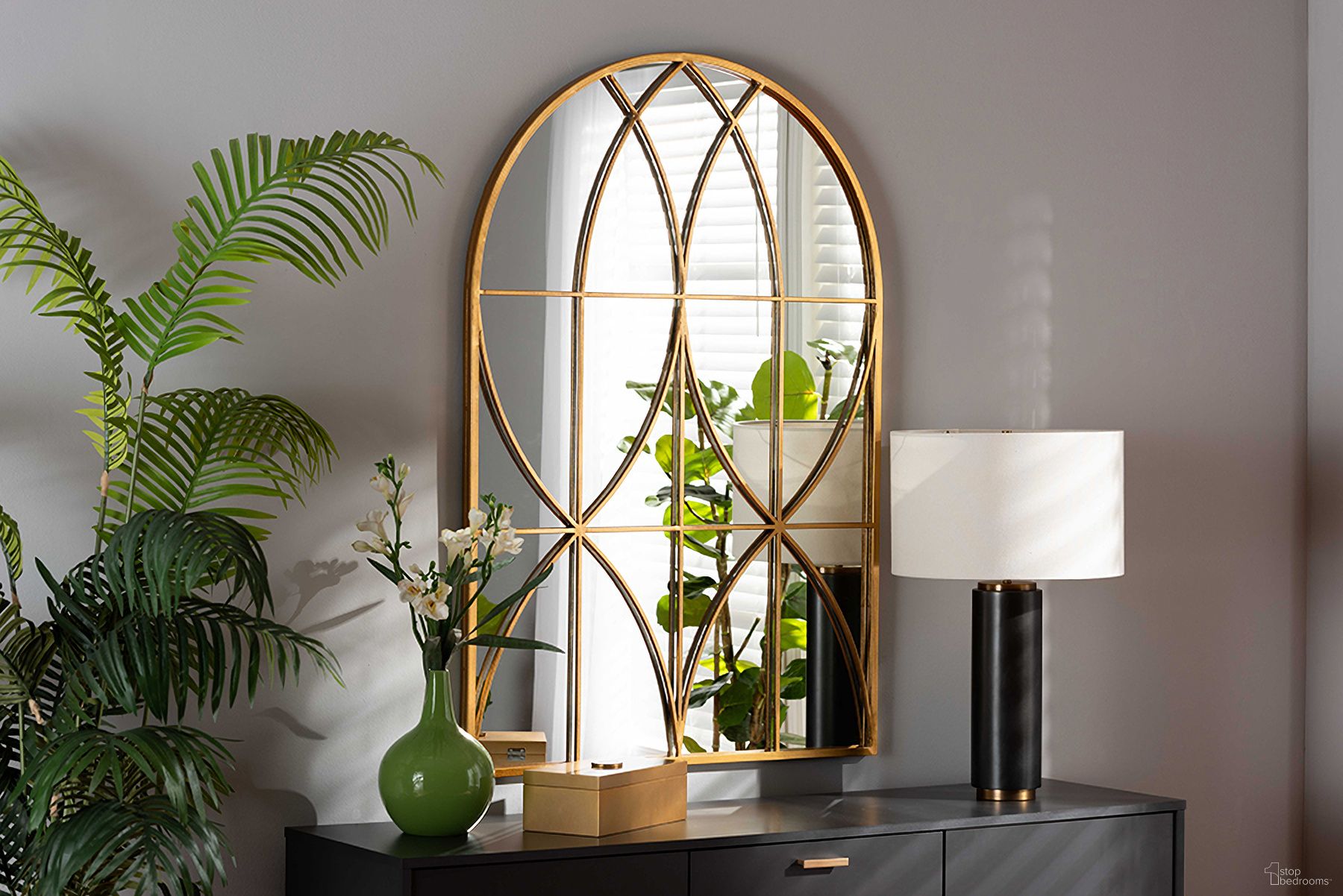 The appearance of Baxton Studio Celerina Modern And Contemporary Gold Finished Metal Accent Wall Mirror designed by Baxton Studio in the modern / contemporary interior design. This gold piece of furniture  was selected by 1StopBedrooms from Celerina Collection to add a touch of cosiness and style into your home. Sku: RXW-10393-Gold. Material: MDF.