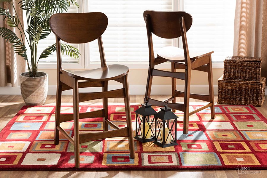 The appearance of Baxton Studio Katya Mid-Century Modern Walnut Brown Finished Wood 2-Piece Counter Stool Set designed by Baxton Studio in the transitional interior design. This walnut brown piece of furniture was selected by 1StopBedrooms from Katya Collection to add a touch of cosiness and style into your home. Sku: RH378P-Walnut Bent Seat-PC-2PK. Material: Wood.