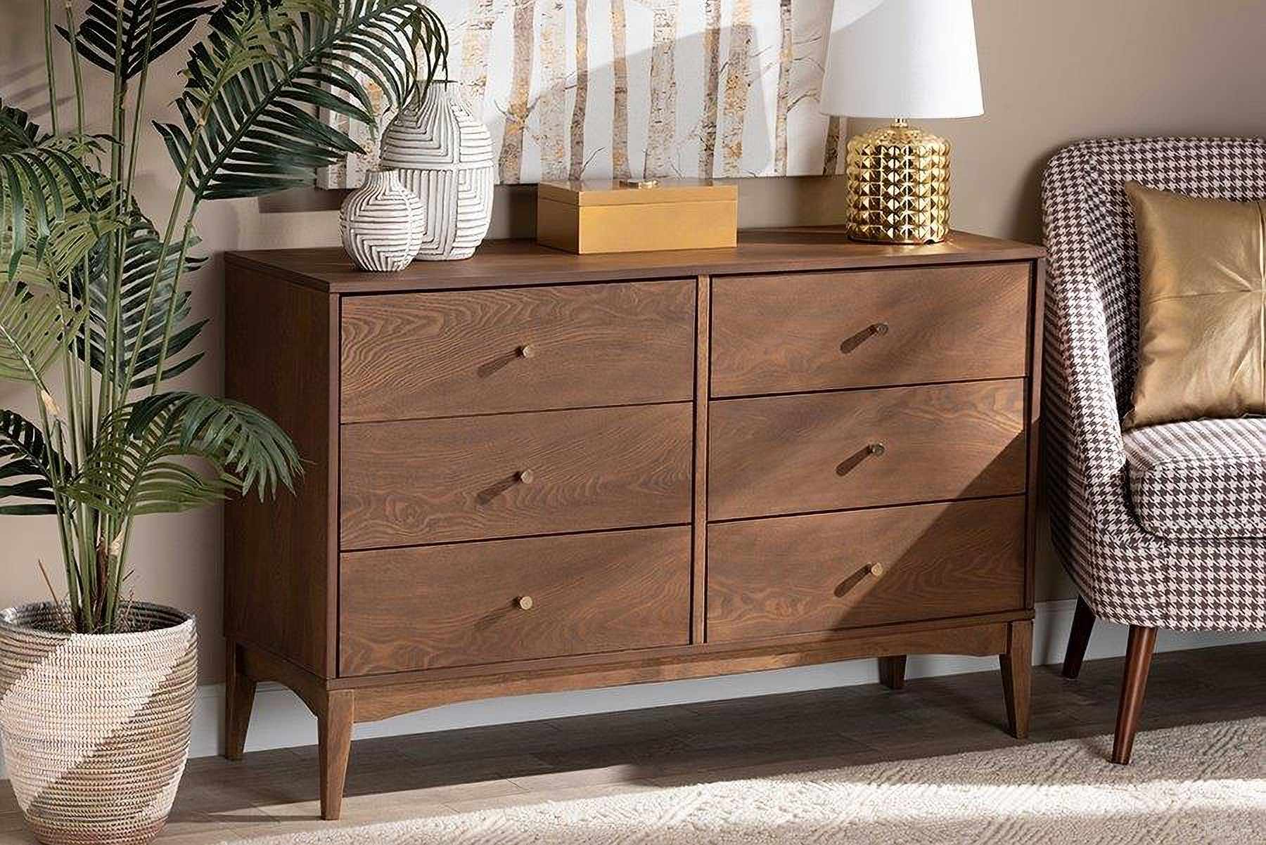 The appearance of Baxton Studio Landis Mid-Century Modern Ash Walnut Finished Wood 6-Drawer Dresser designed by Baxton Studio in the transitional interior design. This ash walnut piece of furniture was selected by 1StopBedrooms from Landis Collection to add a touch of cosiness and style into your home. Sku: MG9002-Ash Walnut-6DW-Dresser. Material: Rubberwood.