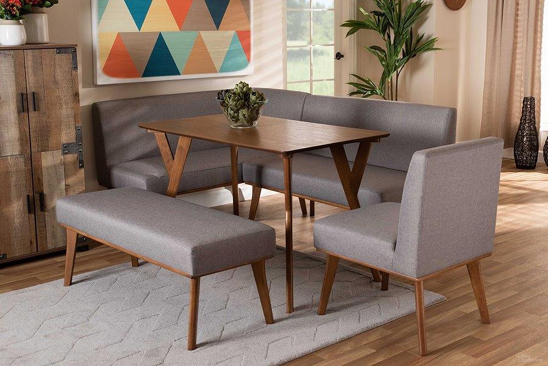 The appearance of Baxton Studio Odessa Mid-Century Modern Grey Fabric Upholstered and Walnut Brown Finished Wood 5-Piece Dining Nook Set designed by Baxton Studio in the transitional interior design. This gray piece of furniture was selected by 1StopBedrooms from Odessa Collection to add a touch of cosiness and style into your home. Sku: BBT8054-Grey/Walnut-5PC Dining Nook Set. Material: MDF.
