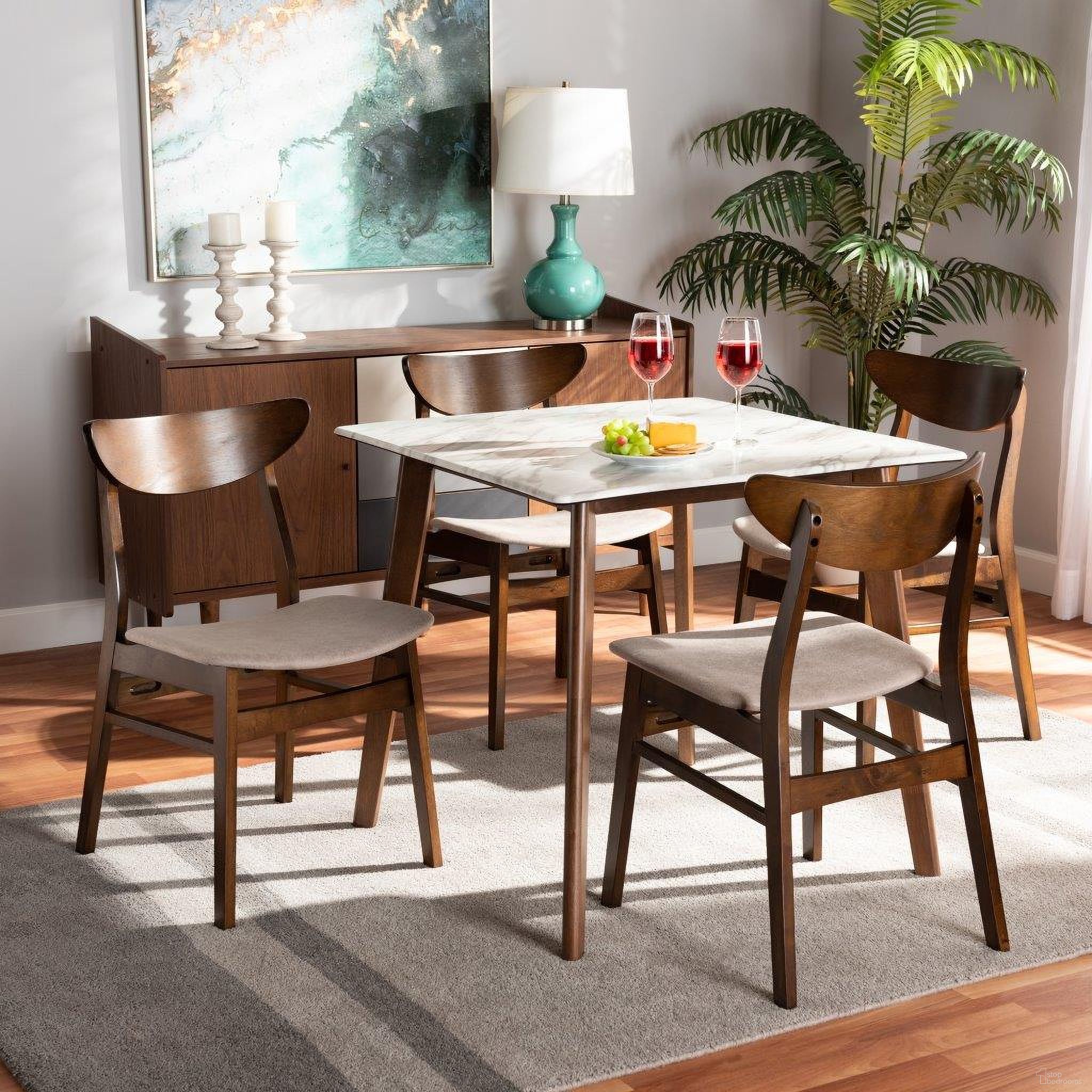 The appearance of Baxton Studio Paras Light Beige Fabric Walnut Brown Wood 5pc Dining Room Set designed by Baxton Studio in the transitional interior design. This beige piece of furniture was selected by 1StopBedrooms from Paras Collection to add a touch of cosiness and style into your home. Sku: Paras-Latte/Walnut-5PC Dining Set. Material: Rubberwood.