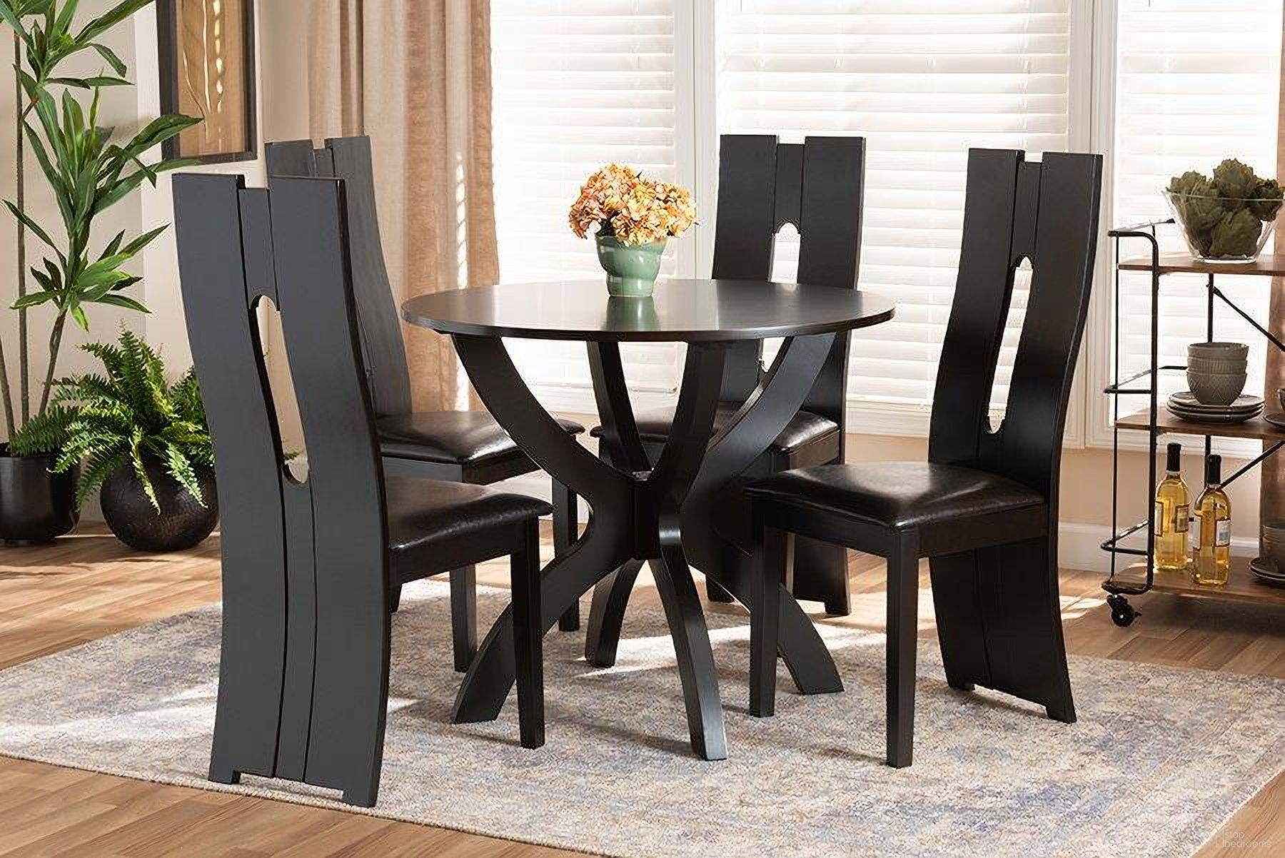 The appearance of Ronda Modern and Contemporary Dark Brown Faux Leather Upholstered and Wood 5-Piece Dining Set designed by Baxton Studio in the modern / contemporary interior design. This dark brown and espresso brown piece of furniture was selected by 1StopBedrooms from Ronda Collection to add a touch of cosiness and style into your home. Sku: Ronda-Dark Brown-5PC Dining Set. Material: Faux Leather.