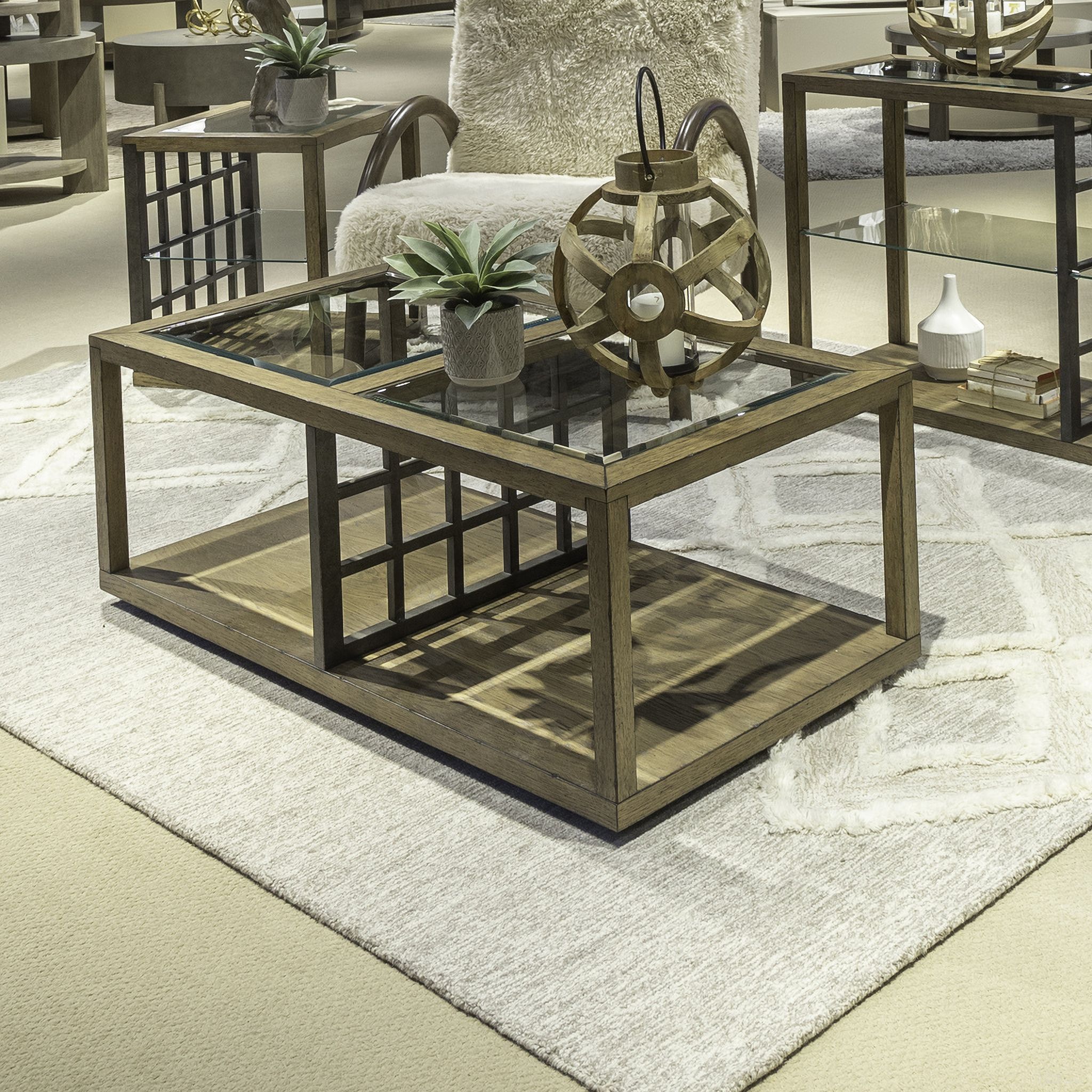 The appearance of Bayhill Trellis Cocktail Table In Honey and Black designed by Liberty in the modern / contemporary interior design. This honey/black piece of furniture  was selected by 1StopBedrooms from Bayhill Trellis Collection to add a touch of cosiness and style into your home. Sku: 525-OT1010. Material: Solid Rubberwood.