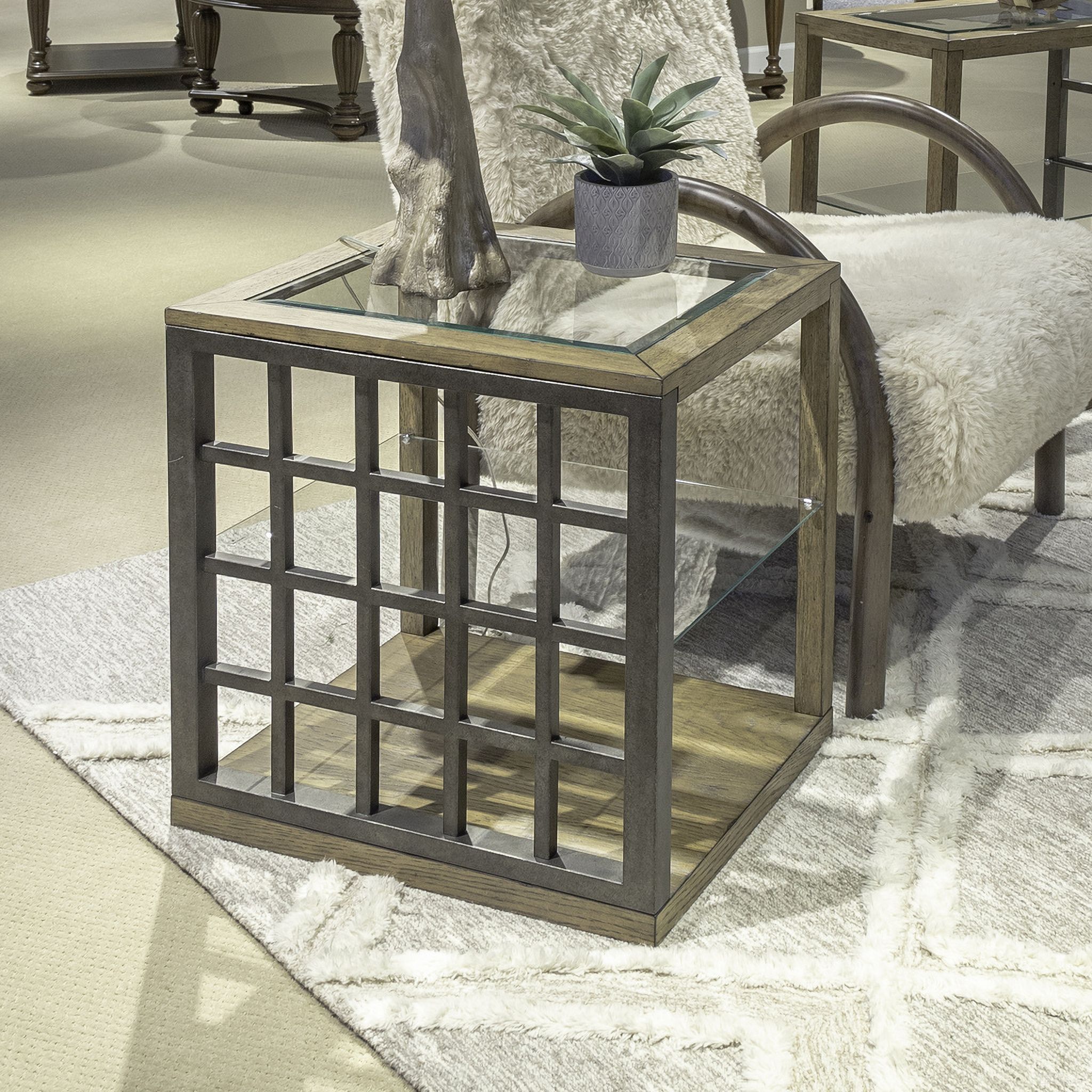 The appearance of Bayhill Trellis End Table In Honey and Black designed by Liberty in the modern / contemporary interior design. This honey/black piece of furniture  was selected by 1StopBedrooms from Bayhill Trellis Collection to add a touch of cosiness and style into your home. Sku: 525-OT1020. Material: Solid Rubberwood.