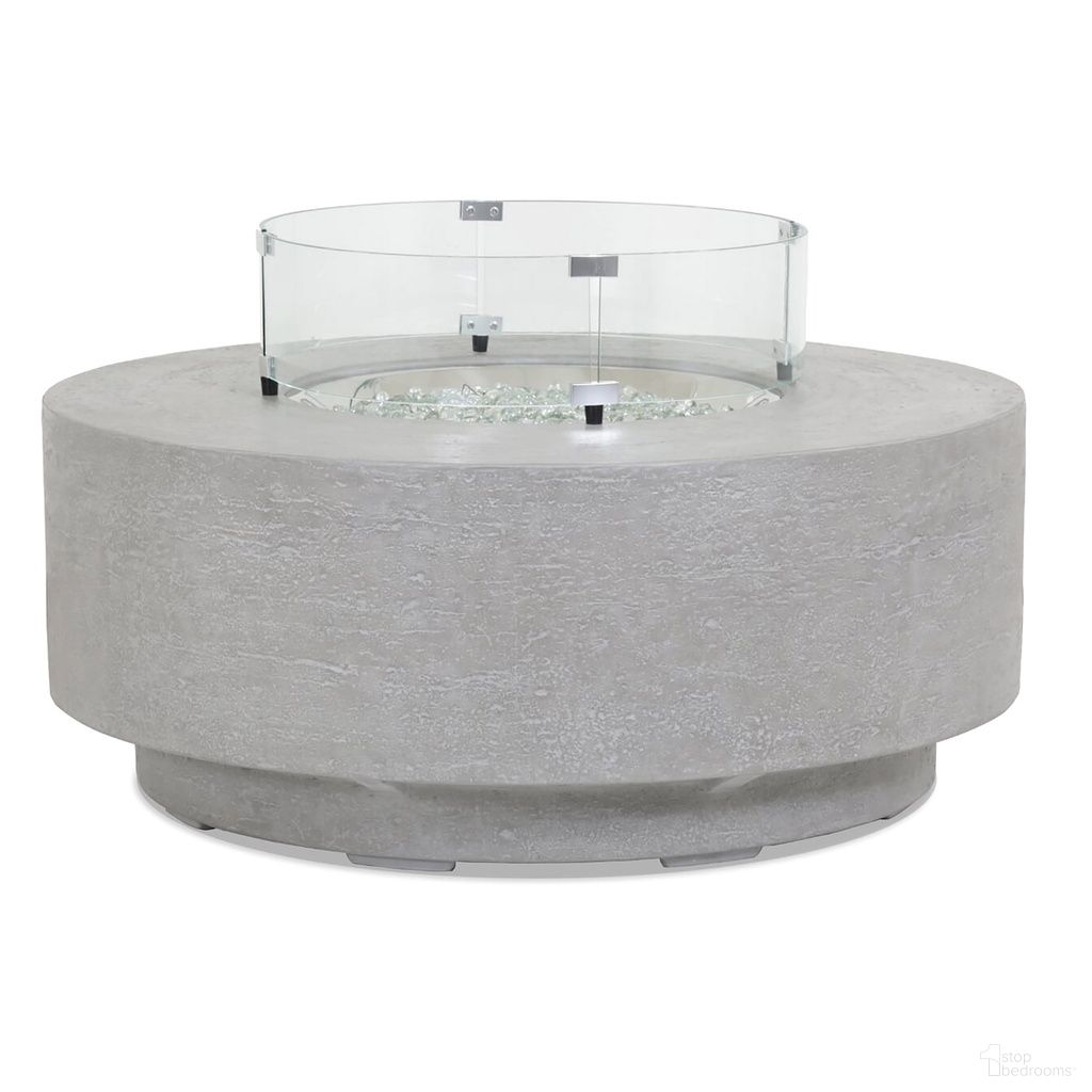The appearance of Bazaar Gravelstone Round Fire Table With Glass Surround in Gray designed by Sunset West in the modern / contemporary interior design. This gray piece of furniture  was selected by 1StopBedrooms from Bazaar Collection to add a touch of cosiness and style into your home. Sku: SW6003-FT41R-G23R. Material: Concrete.