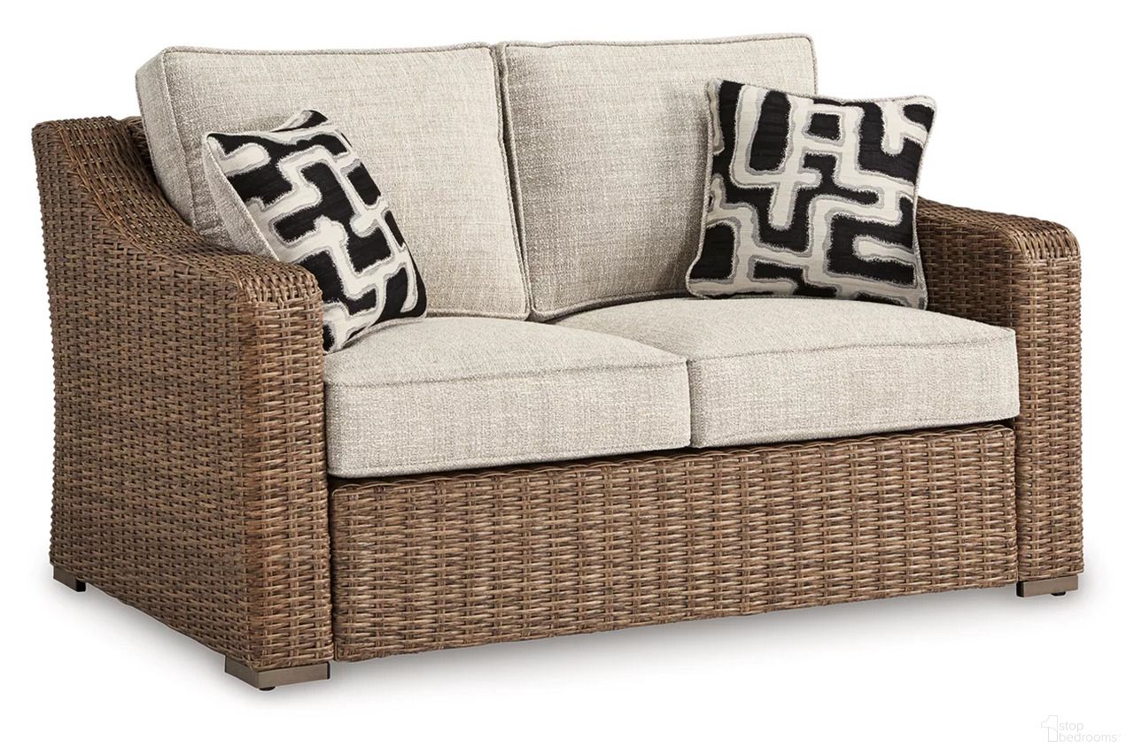 The appearance of Beachcroft Outdoor Loveseat with Cushion In Beige designed by Signature Design by Ashley in the transitional interior design. This beige piece of furniture was selected by 1StopBedrooms from Beachcroft Collection to add a touch of cosiness and style into your home. Sku: P791-835. Material: Fabric.
