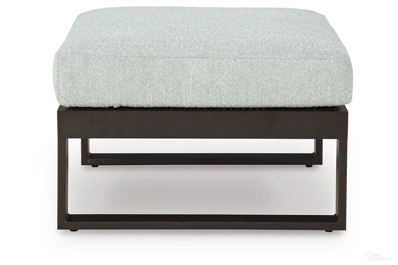 The appearance of Beachloft Outdoor Ottoman with Cushion In Black and Gray designed by Signature Design by Ashley in the transitional interior design. This black and gray piece of furniture was selected by 1StopBedrooms from Beachloft Collection to add a touch of cosiness and style into your home. Sku: P490-814. Material: Fabric.