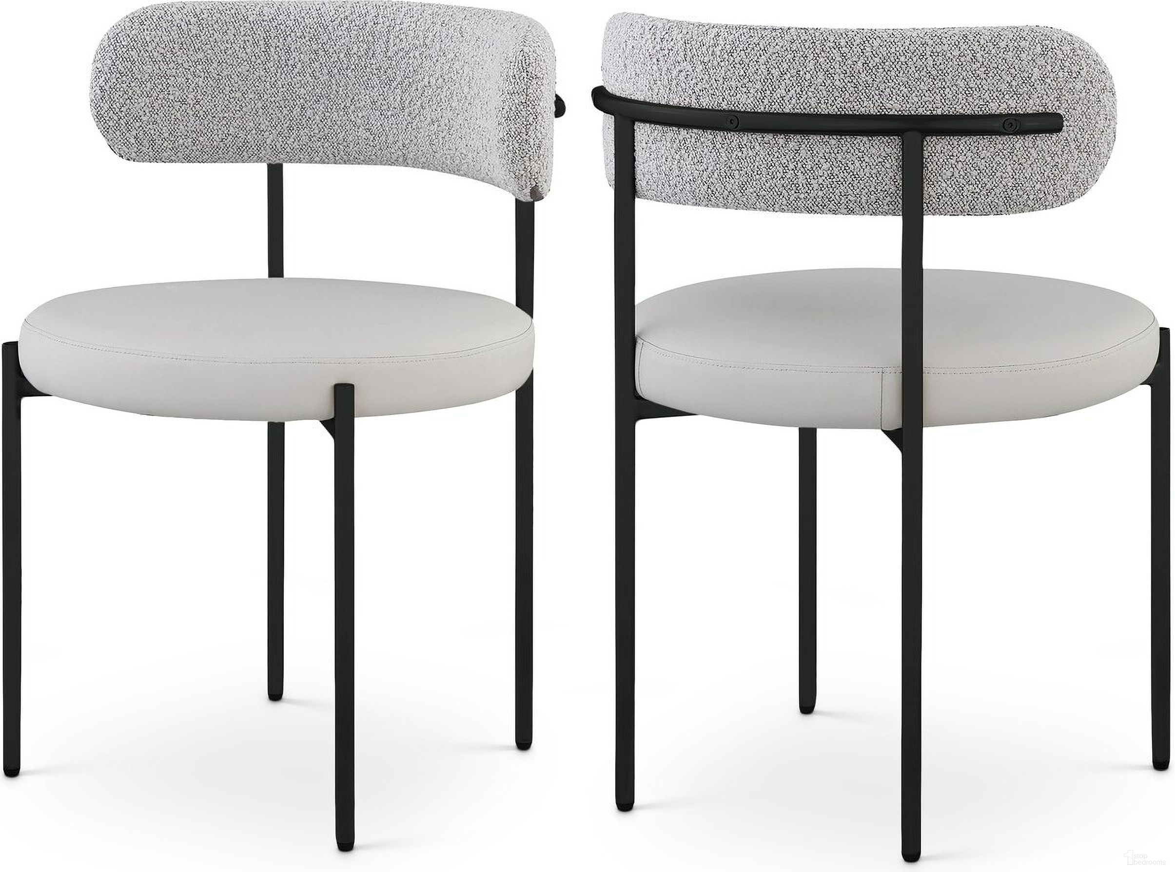 The appearance of Beacon Vegan Leather and Boucle Fabric Dining Chair Set of 2 In Taupe/Matte Black designed by Meridian in the modern / contemporary interior design. This taupe piece of furniture  was selected by 1StopBedrooms from Beacon Collection to add a touch of cosiness and style into your home. Sku: 881Taupe-C. Material: Iron. Chair Type: Side Chair.