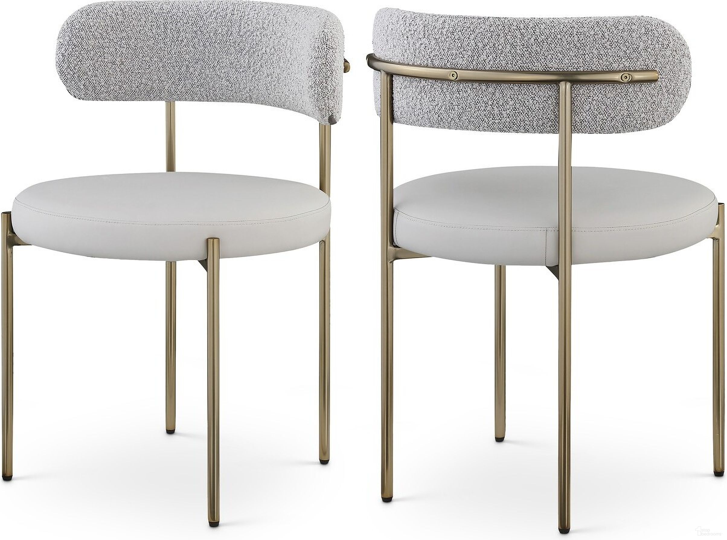 The appearance of Beacon Vegan Leather and Boucle Fabric Dining Chair Set of 2 In Taupe/Brushed Brass designed by Meridian in the modern / contemporary interior design. This taupe piece of furniture was selected by 1StopBedrooms from Beacon Collection to add a touch of cosiness and style into your home. Sku: 886Taupe-C. Material: Iron. Chair Type: Side Chair.