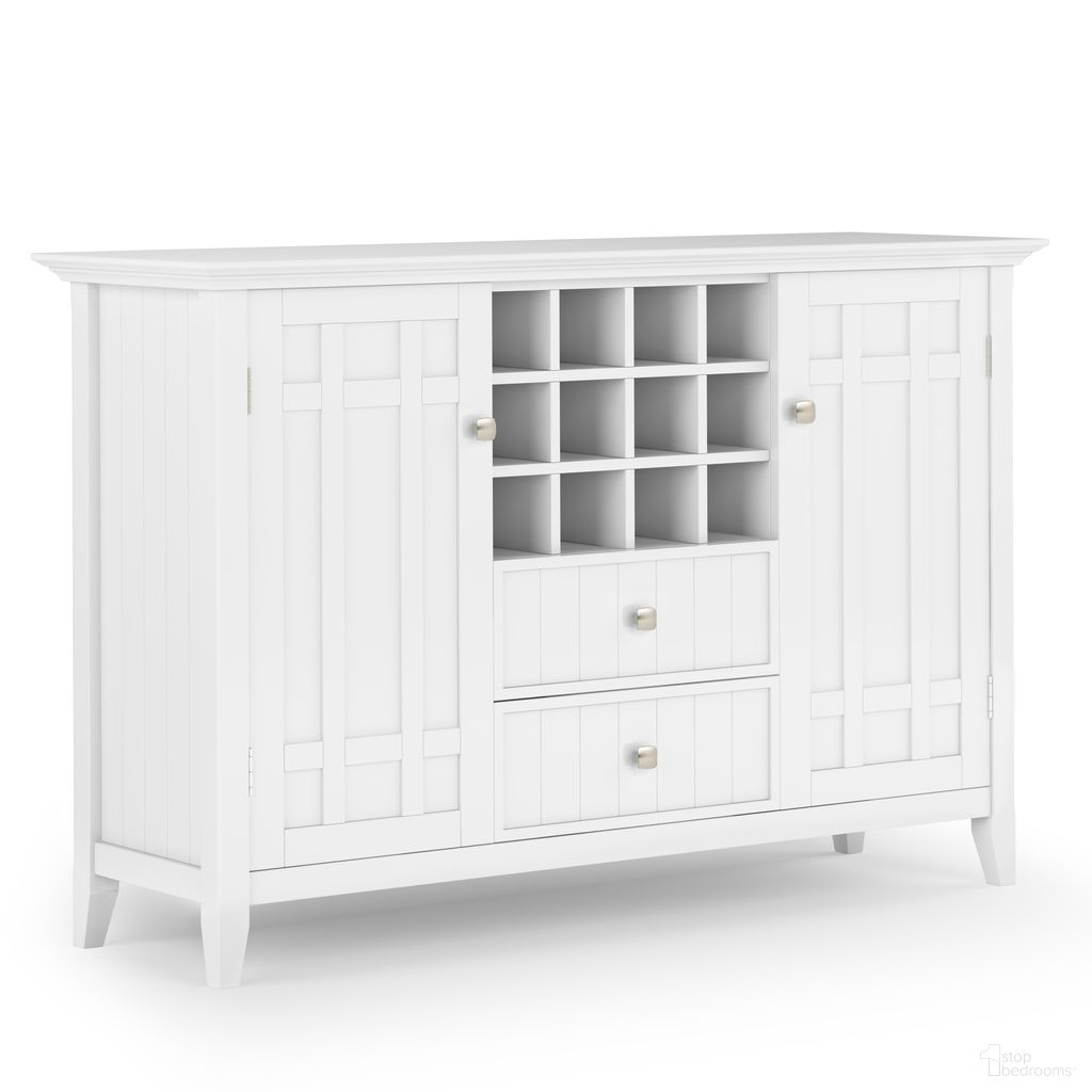 The appearance of Bedford Solid Wood Sideboard Buffet and Wine Rack In White designed by Simpli Home in the transitional interior design. This white piece of furniture  was selected by 1StopBedrooms from Bedford Collection to add a touch of cosiness and style into your home. Sku: AXCBED-04-WH. Material: Pine.