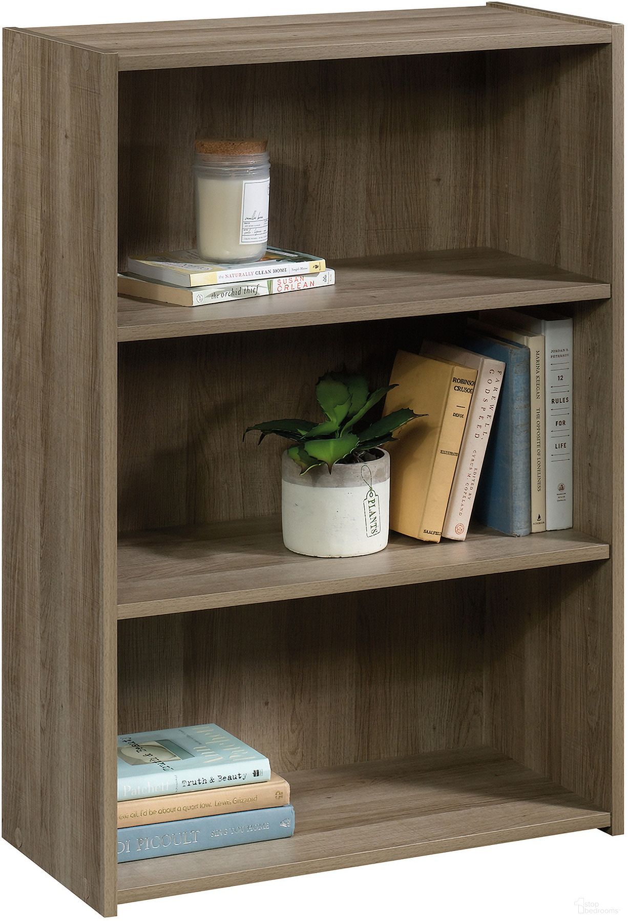 The appearance of Beginnings 3-Shelf Bookcase In Summer Oak designed by Sauder in the transitional interior design. This summer oak piece of furniture was selected by 1StopBedrooms from Beginnings Collection to add a touch of cosiness and style into your home. Sku: 424260. Material: Engineered Wood.