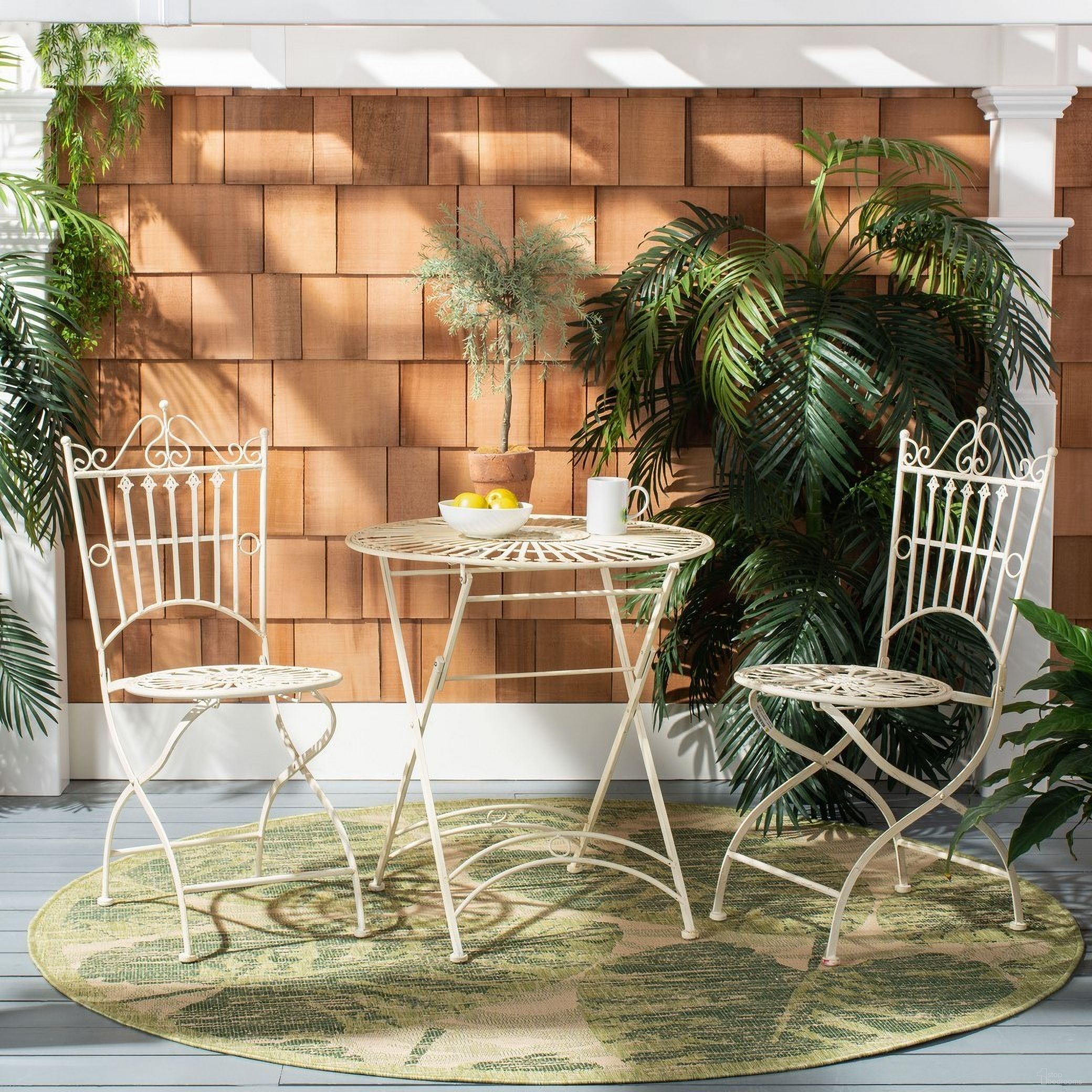 The appearance of Belen Bistro Set, One Table And Two Chairs In Pearl White designed by Safavieh in the modern / contemporary interior design. This pearl white piece of furniture was selected by 1StopBedrooms from Belen Collection to add a touch of cosiness and style into your home. Sku: PAT5020A. Material: Iron.