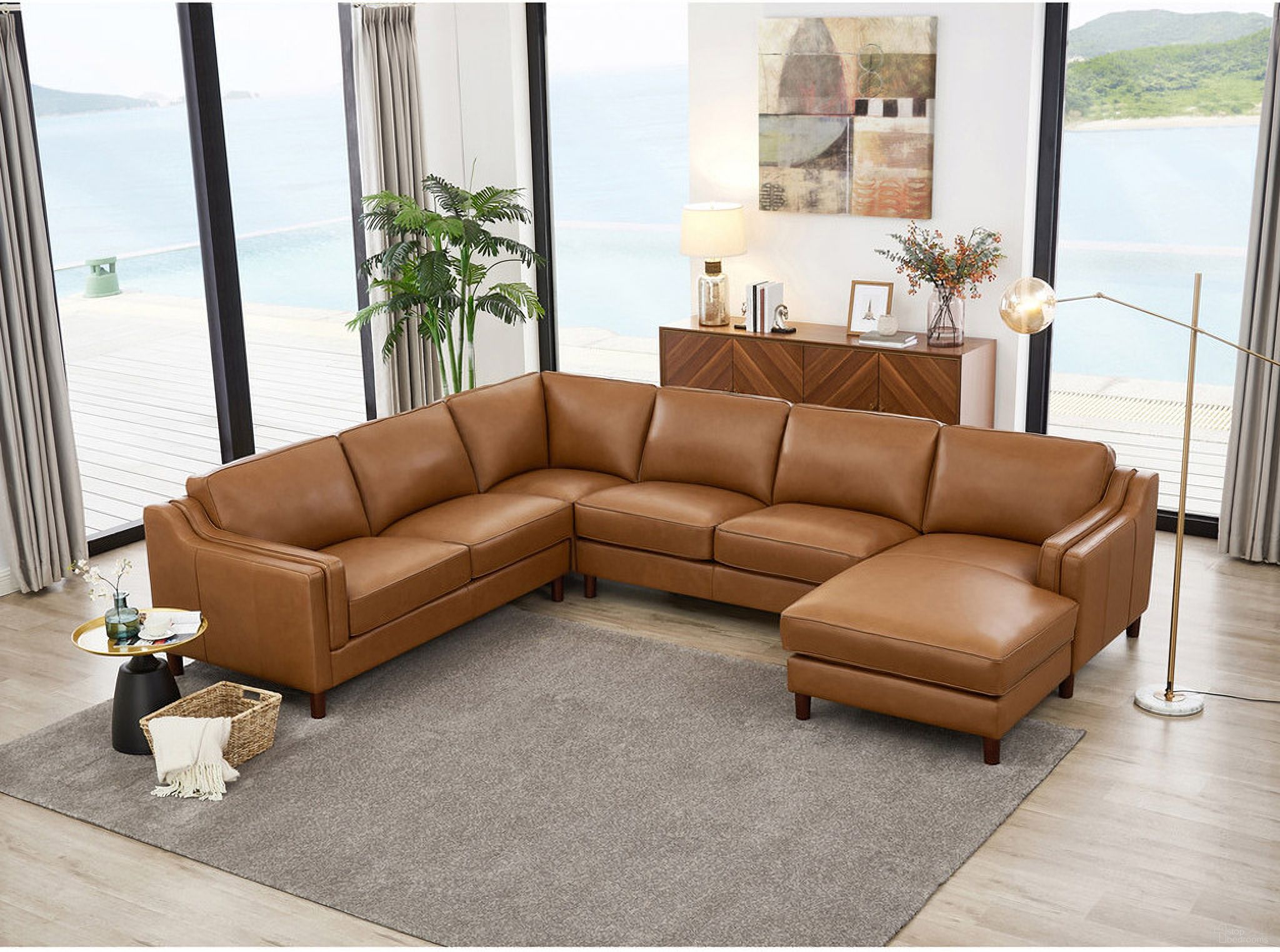 The appearance of Bella Leather RAF Chaise Sectional In Cognac designed by Hydeline in the modern / contemporary interior design. This cognac piece of furniture  was selected by 1StopBedrooms from Bella Collection to add a touch of cosiness and style into your home. Sku: 6932-25-2523;6932-12-2523;6932-02-2523;6932-14-2523. Material: Leather.
