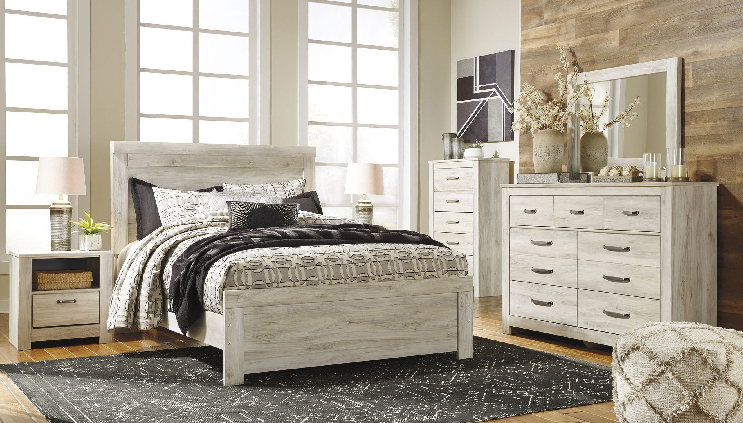 The appearance of Bellaby White Panel Bedroom Set designed by Signature Design by Ashley in the transitional interior design. This white wash piece of furniture  was selected by 1StopBedrooms from Bellaby Collection to add a touch of cosiness and style into your home. Sku: B331-57;B331-54;B331-96;B331-91. Bed Type: Panel Bed. Material: Wood. Bed Size: Queen.