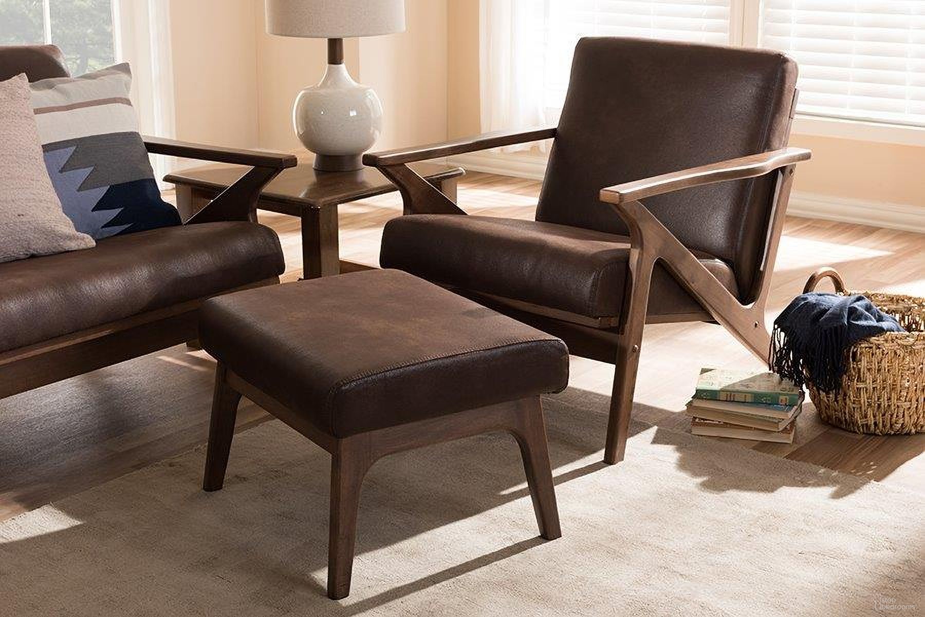 The appearance of Bianca Mid-Century Modern Walnut Wood Dark Brown Distressed Faux Leather Lounge Chair And Ottoman Set designed by Baxton Studio in the transitional interior design. This walnut piece of furniture was selected by 1StopBedrooms from Bianca Collection to add a touch of cosiness and style into your home. Sku: Bianca-Dark Brown/Walnut Brown-2PC-Set. Material: Rubberwood.