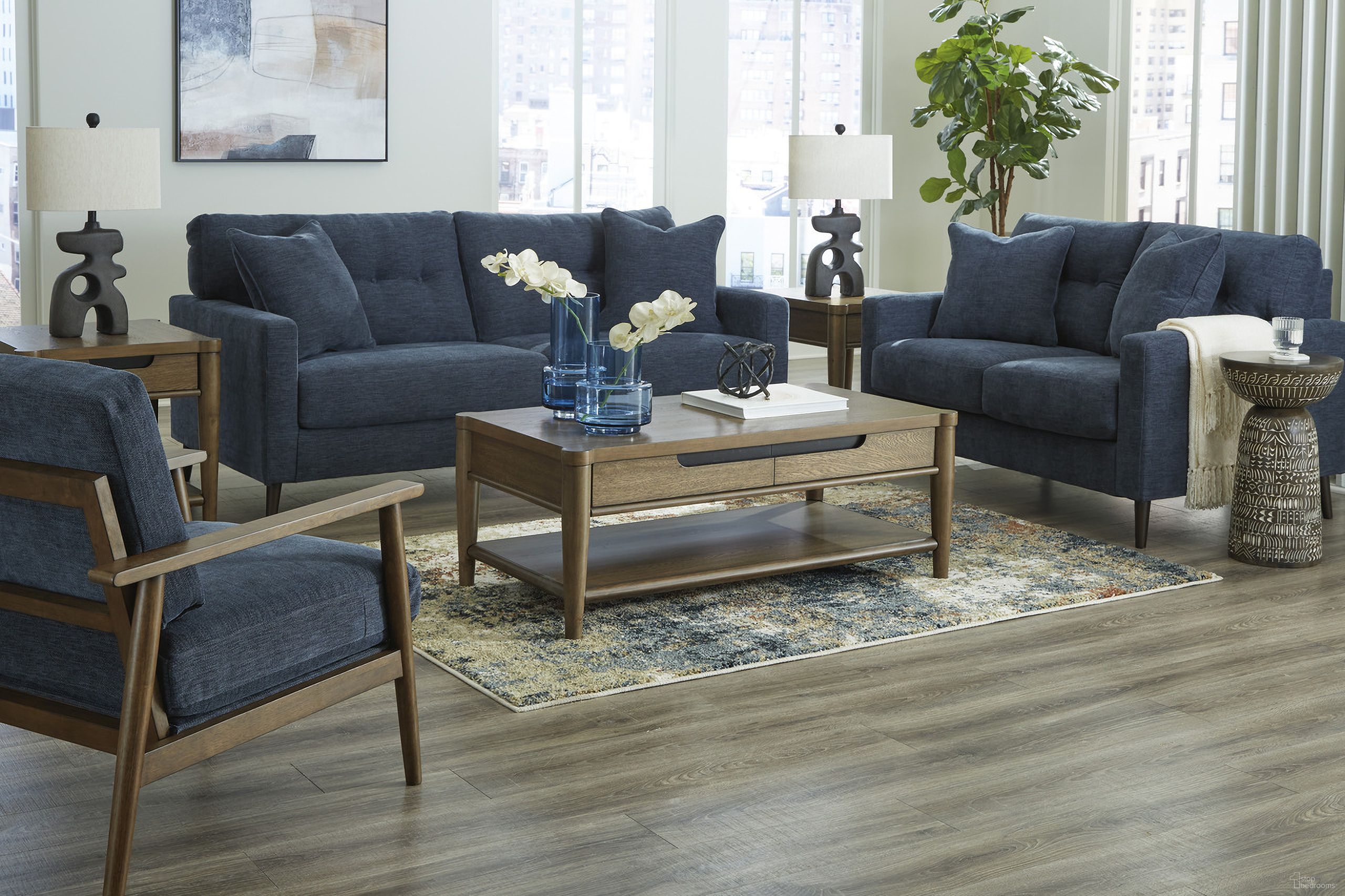 The appearance of Bixler Living Room Set In Navy designed by Signature Design by Ashley in the modern / contemporary interior design. This navy piece of furniture was selected by 1StopBedrooms from Bixler Collection to add a touch of cosiness and style into your home. Sku: 2610638;2610635. Material: Fabric.