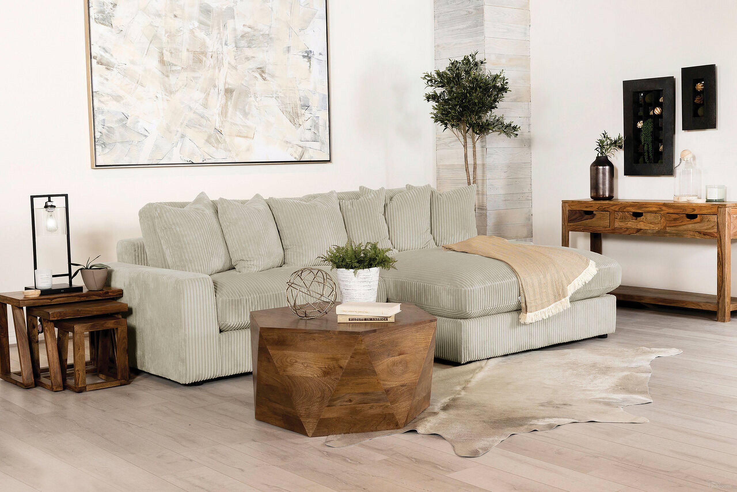 The appearance of Blaine Upholstered Reversible Sectional Sofa Sand designed by Coaster in the modern / contemporary interior design. This sand piece of furniture  was selected by 1StopBedrooms from Blaine Collection to add a touch of cosiness and style into your home. Sku: 509899B1;509899B2. Material: Corduroy.