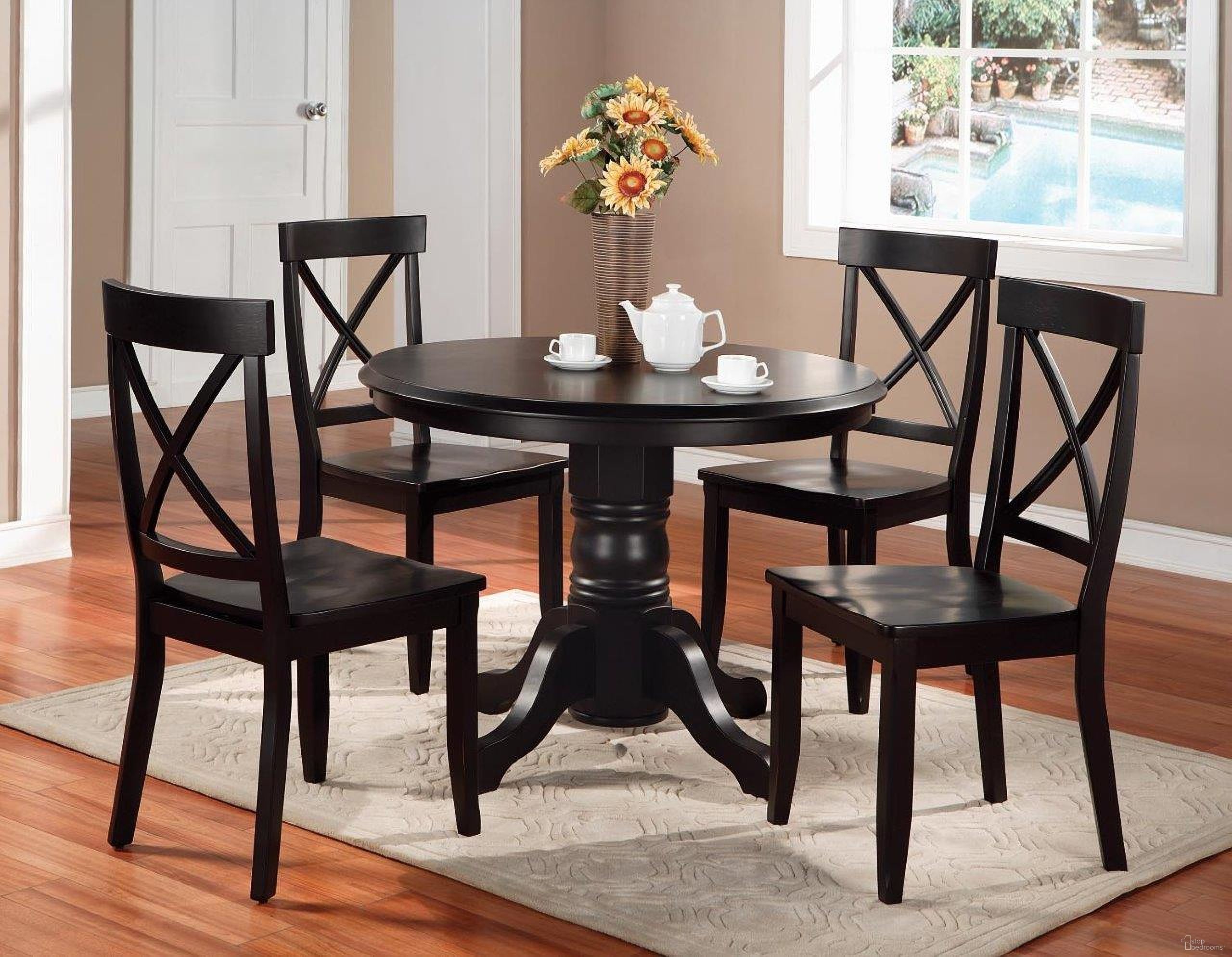 The appearance of Blair Black 5 Piece Dining Set designed by Homestyles in the traditional interior design. This black piece of furniture  was selected by 1StopBedrooms from Blair Collection to add a touch of cosiness and style into your home. Sku: 5178-301;5178-302;5178-80;5178-80. Material: Wood.