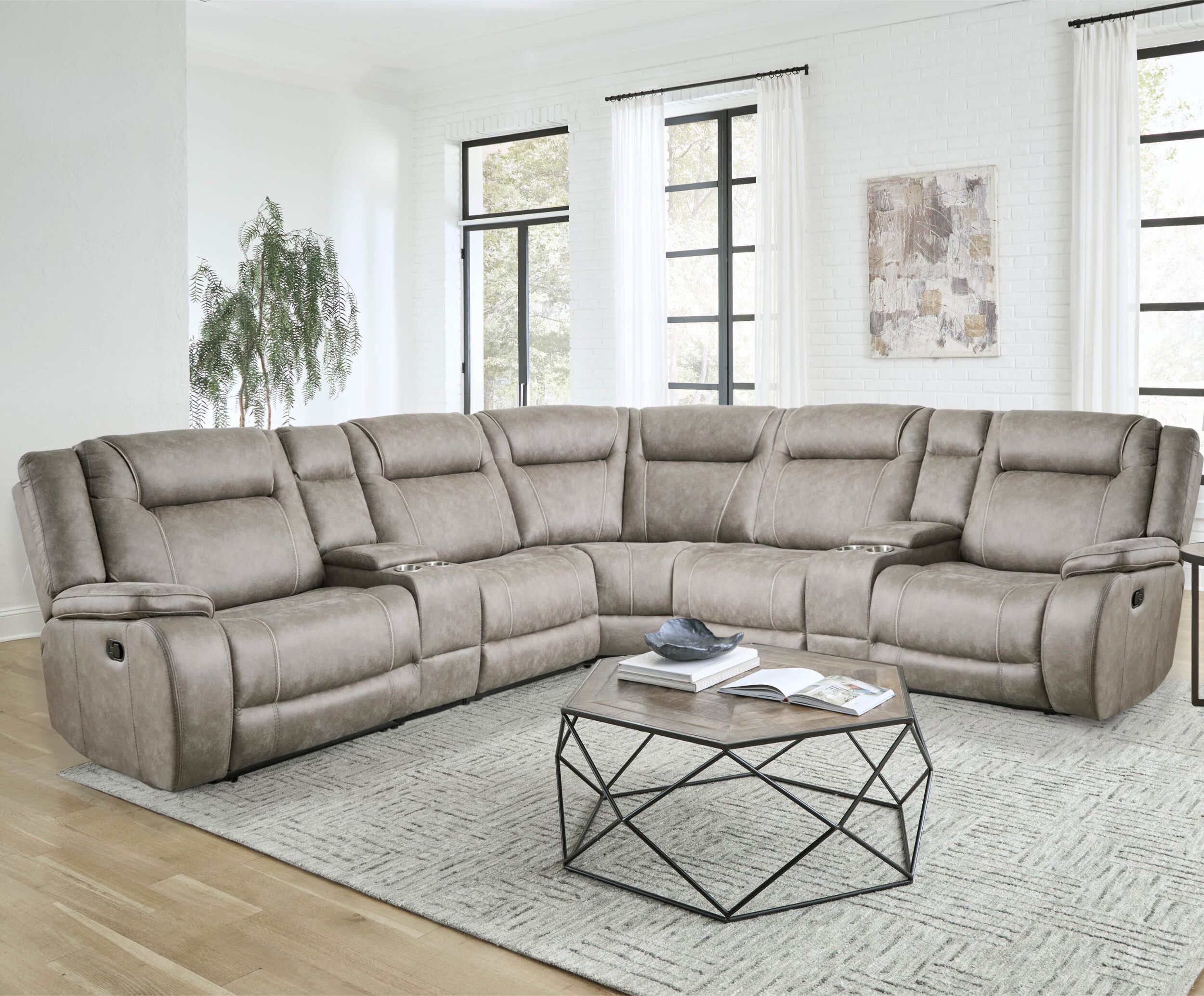 The appearance of Blake 7 Piece Modular Reclining Sectional with Entertainment Console In Desert Taupe designed by Parker House in the transitional interior design. This desert taupe piece of furniture was selected by 1StopBedrooms from Blake Collection to add a touch of cosiness and style into your home. Sku: MBLA#810-DTAU;MBLA#811L-DTAU;MBLA#811R-DTAU;MBLA#840-DTAU;MBLA#850-DTAU;MBLA#860-DTAU;MBLA#860-DTAU. Material: Leather. Layout: L-Shape.