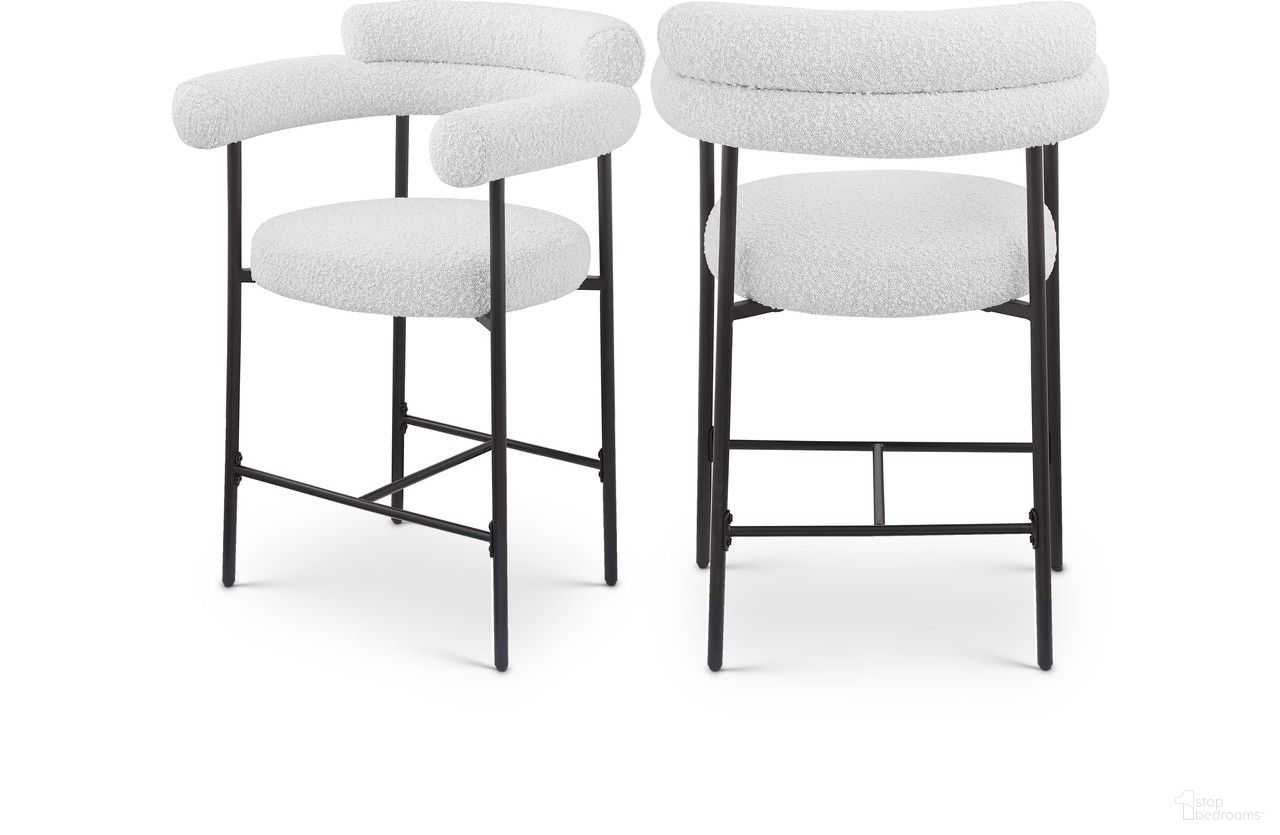 The appearance of Blake Boucle Fabric Counter Stool Set of 2 In Cream designed by Meridian in the modern / contemporary interior design. This cream piece of furniture was selected by 1StopBedrooms from Blake Collection to add a touch of cosiness and style into your home. Sku: 986Cream-C. Material: Iron.