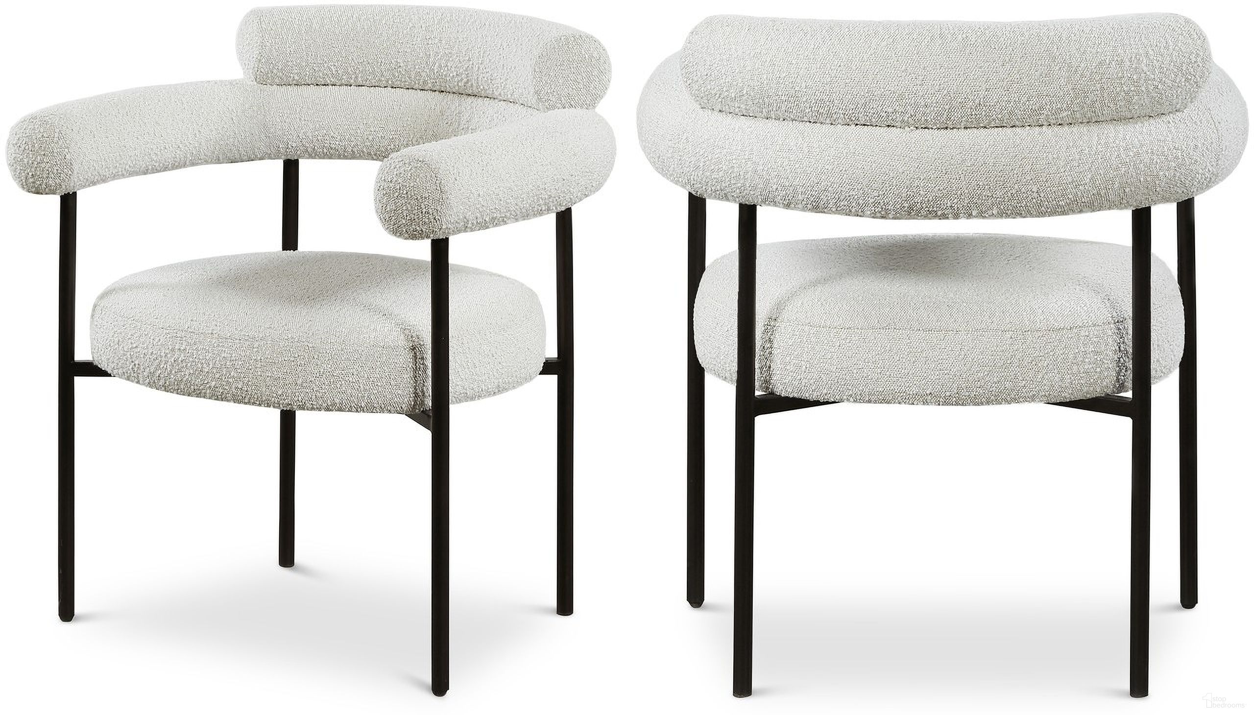 The appearance of Blake Boucle Fabric Dining Chair Set of 2 In Cream/Matte Black designed by Meridian in the modern / contemporary interior design. This cream piece of furniture was selected by 1StopBedrooms from Blake Collection to add a touch of cosiness and style into your home. Sku: 879Cream-C. Material: Iron. Chair Type: Arm Chair.