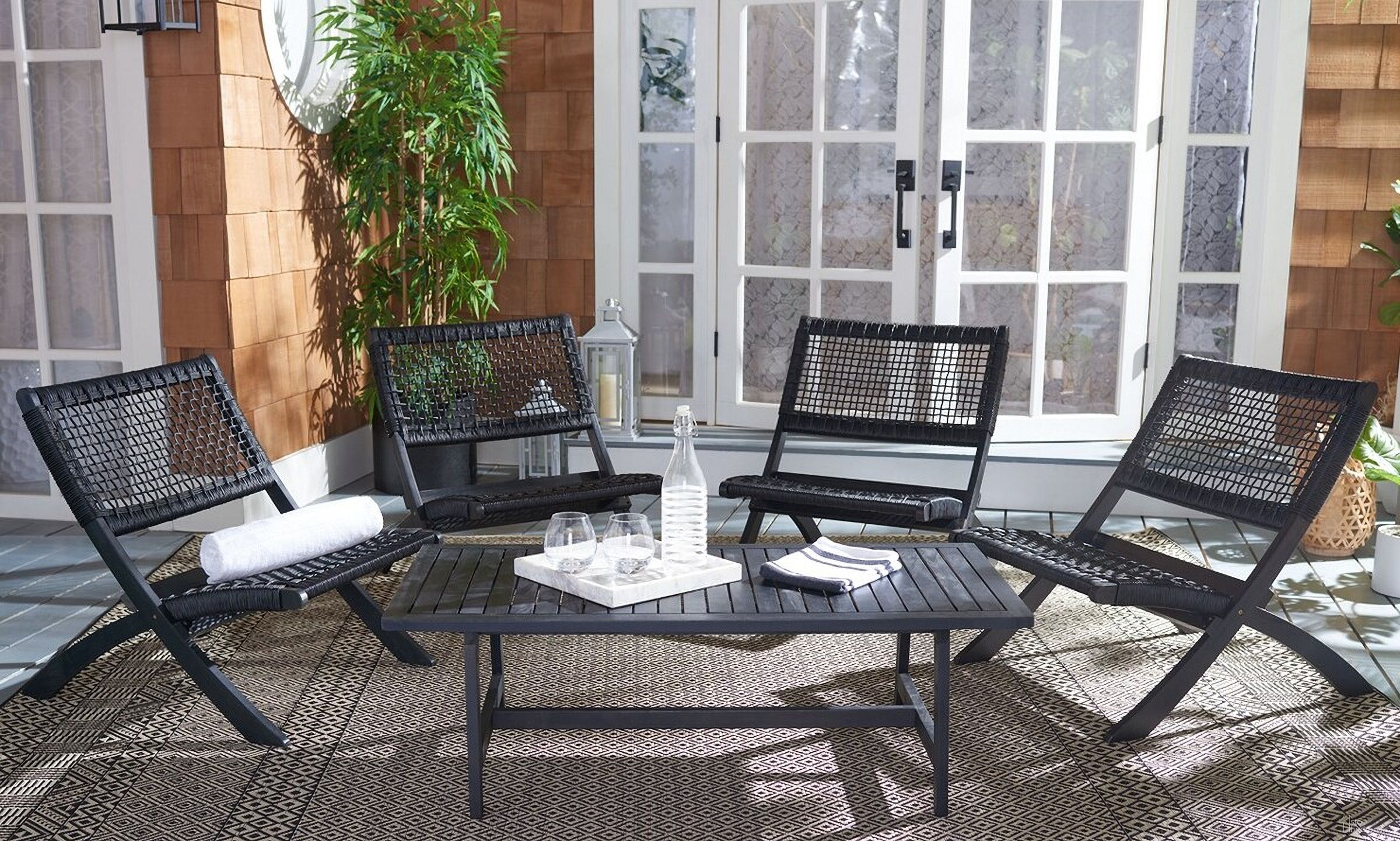 The appearance of Blaze 5 Piece Coffee Set In Black designed by Safavieh in the modern / contemporary interior design. This black piece of furniture  was selected by 1StopBedrooms from Blaze Collection to add a touch of cosiness and style into your home. Sku: PAT7080C. Material: Wood.