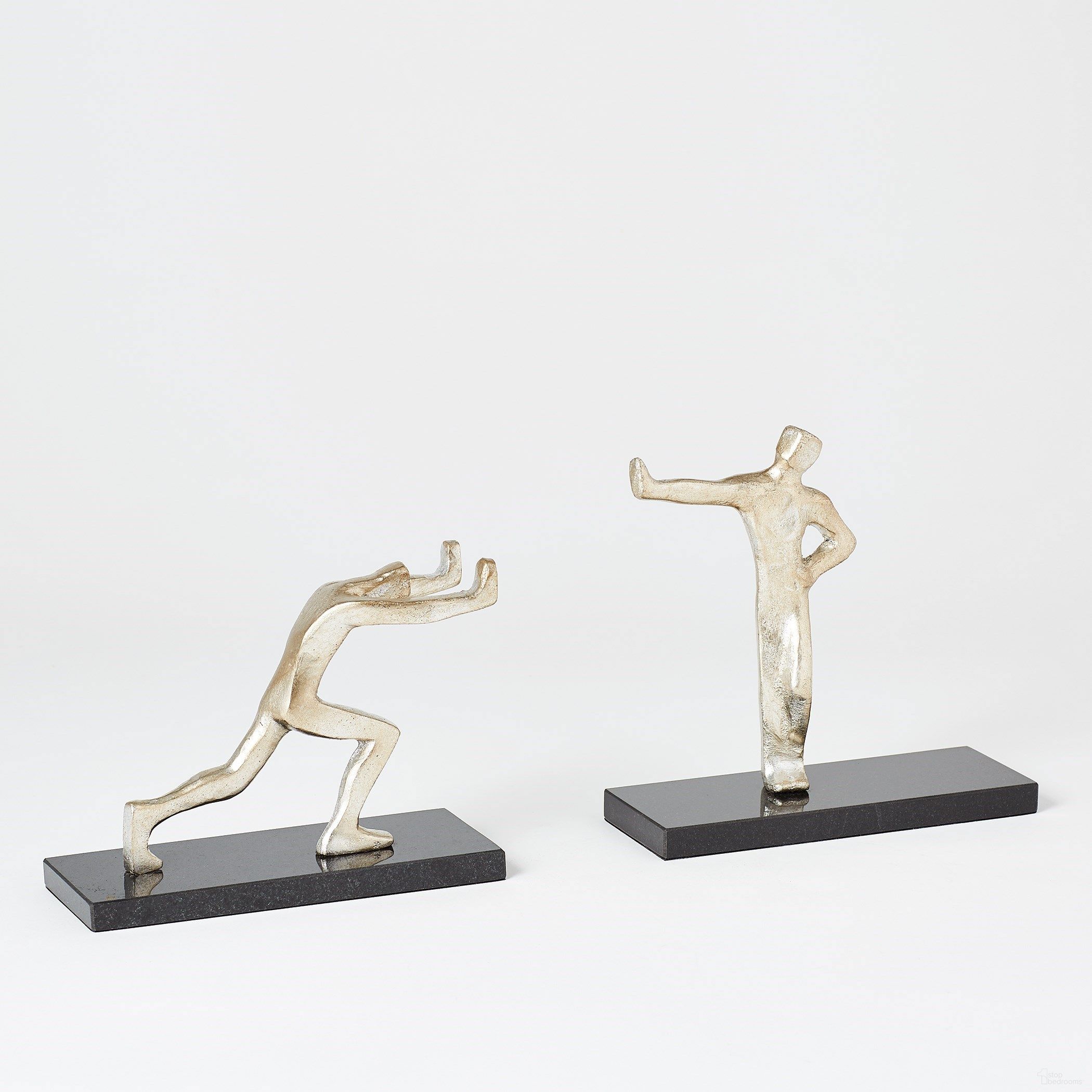 The appearance of Blockhead Bookends In Nickel designed by Global Views in the modern / contemporary interior design. This nickel piece of furniture  was selected by 1StopBedrooms from  to add a touch of cosiness and style into your home. Sku: 881021. Material: Iron.