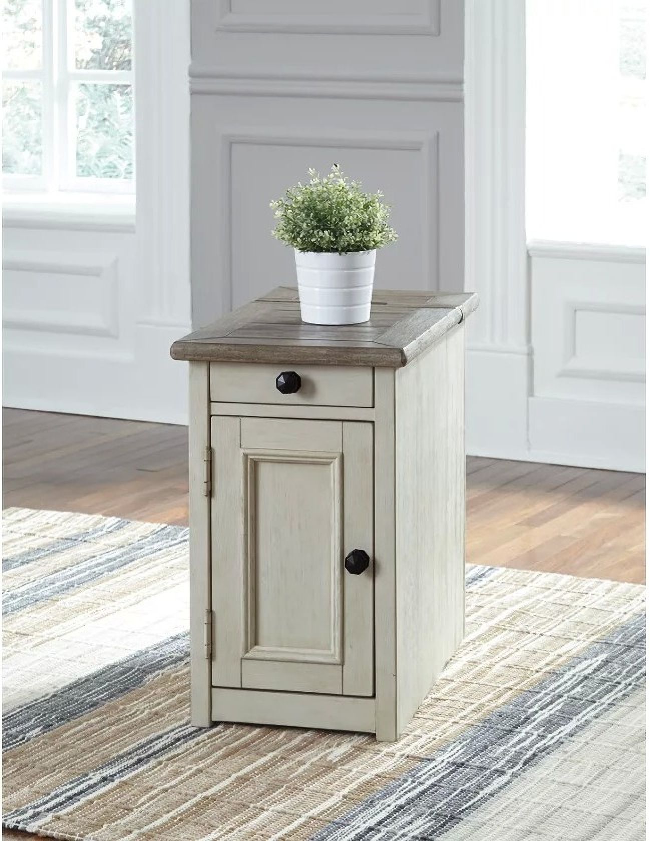 The appearance of Bolanburg Weathered Gray Chair Side End Table designed by Signature Design by Ashley in the transitional interior design. This two-tone piece of furniture was selected by 1StopBedrooms from Bolanburg Collection to add a touch of cosiness and style into your home. Sku: T637-7. Material: Wood.