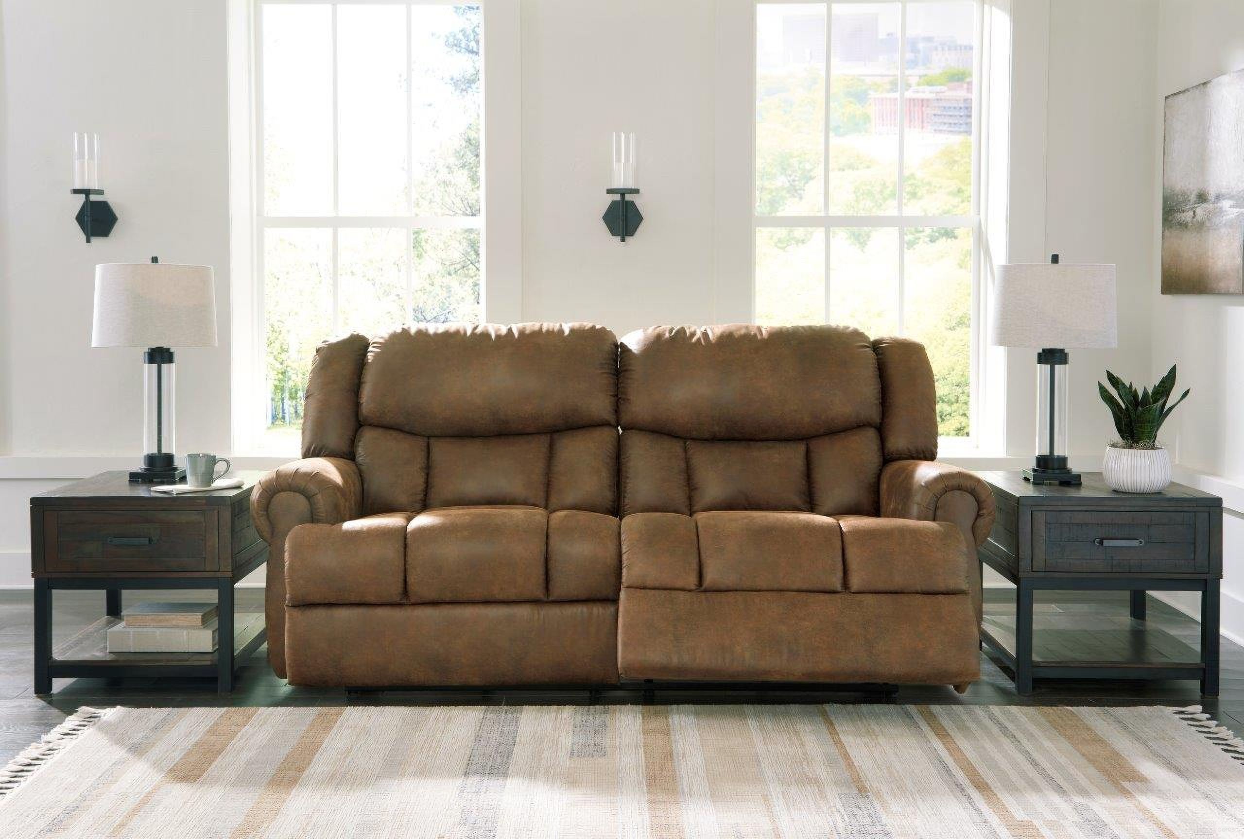 The appearance of Boothbay Auburn 2 Seat Reclining Sofa designed by Signature Design by Ashley in the traditional interior design. This auburn piece of furniture was selected by 1StopBedrooms from Boothbay Collection to add a touch of cosiness and style into your home. Sku: 4470481. Material: Faux Leather.