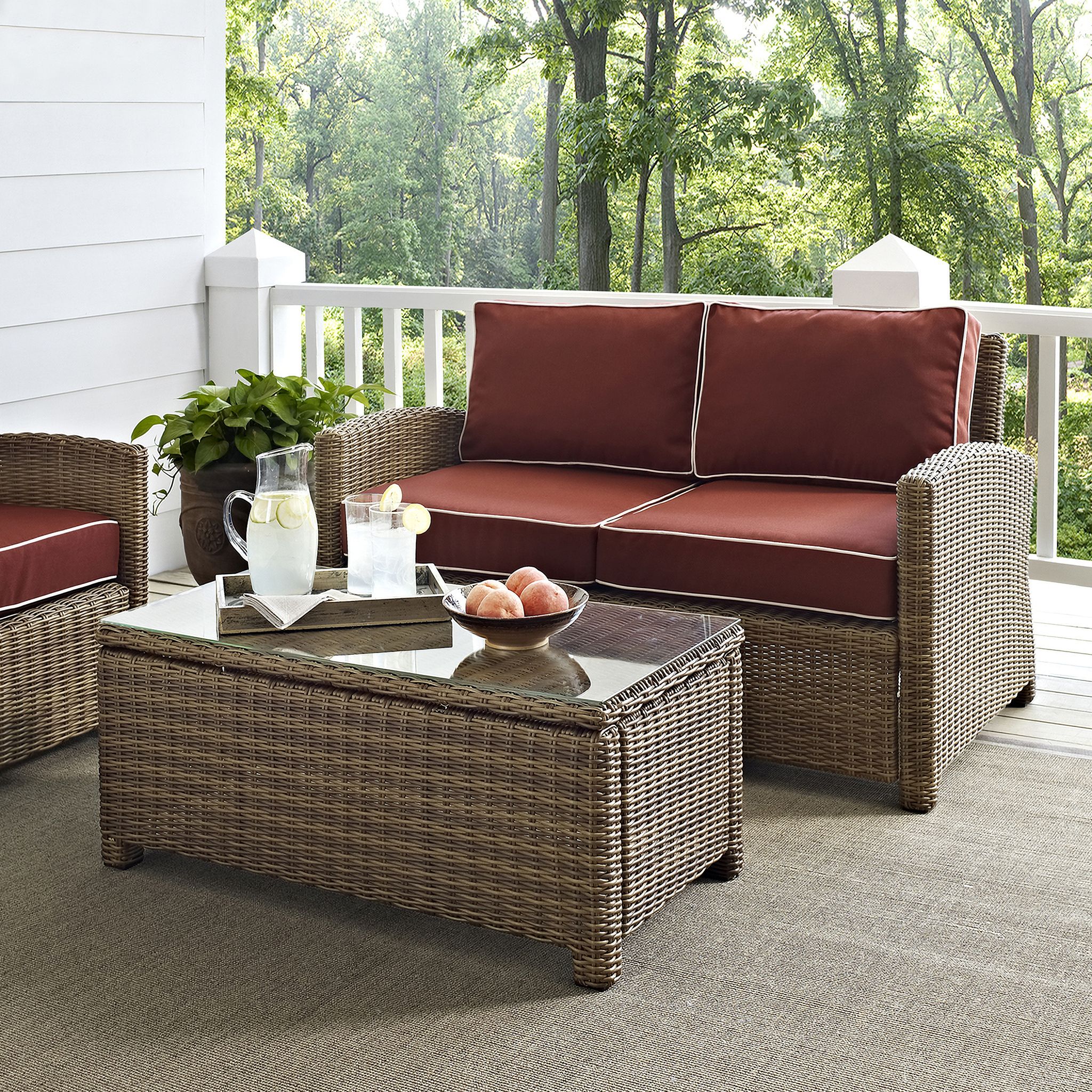 The appearance of Bradenton 2 Piece Wicker Outdoor Loveseat Patio Furniture Set In Sangria and Weathered Brown designed by Crosley Brands in the traditional interior design. This sangria piece of furniture  was selected by 1StopBedrooms from Bradenton Collection to add a touch of cosiness and style into your home. Sku: CO7115-WB;CO7208-WB;MO7499-SG. Material: Steel.