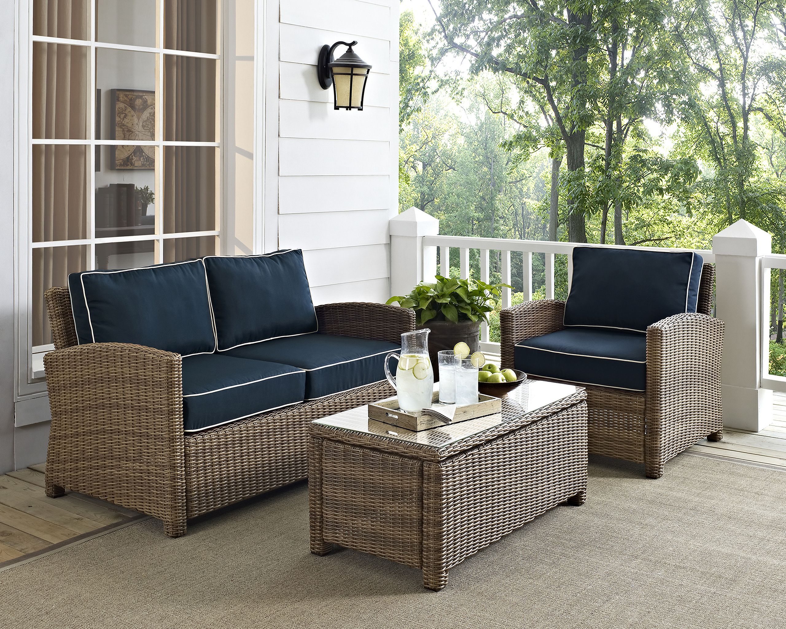 The appearance of Bradenton 3 Piece Wicker Outdoor Loveseat Patio Furniture Set In Navy and Weathered Brown designed by Crosley Brands in the traditional interior design. This navy piece of furniture was selected by 1StopBedrooms from Bradenton Collection to add a touch of cosiness and style into your home. Sku: CO7115-WB;CO7116-WB;CO7208-WB;MO7495-NV. Material: Steel.