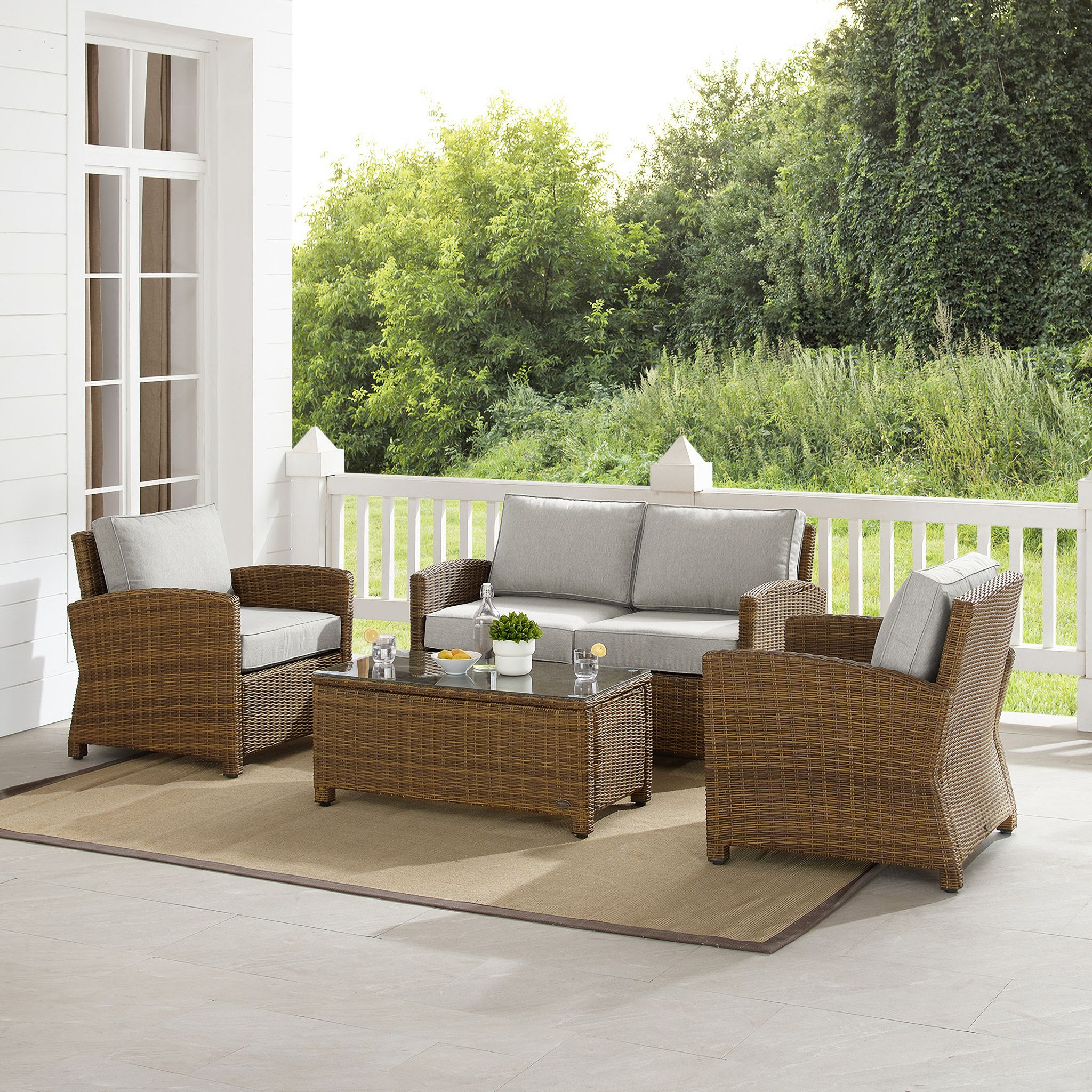 The appearance of Bradenton 4 Piece Wicker Outdoor Loveseat Patio Furniture Set In Gray and Weathered Brown designed by Crosley Brands in the traditional interior design. This gray piece of furniture was selected by 1StopBedrooms from Bradenton Collection to add a touch of cosiness and style into your home. Sku: CO7115-WB;CO7116-WB;CO7116-WB;CO7208-WB;MO7496-GY. Material: Steel.