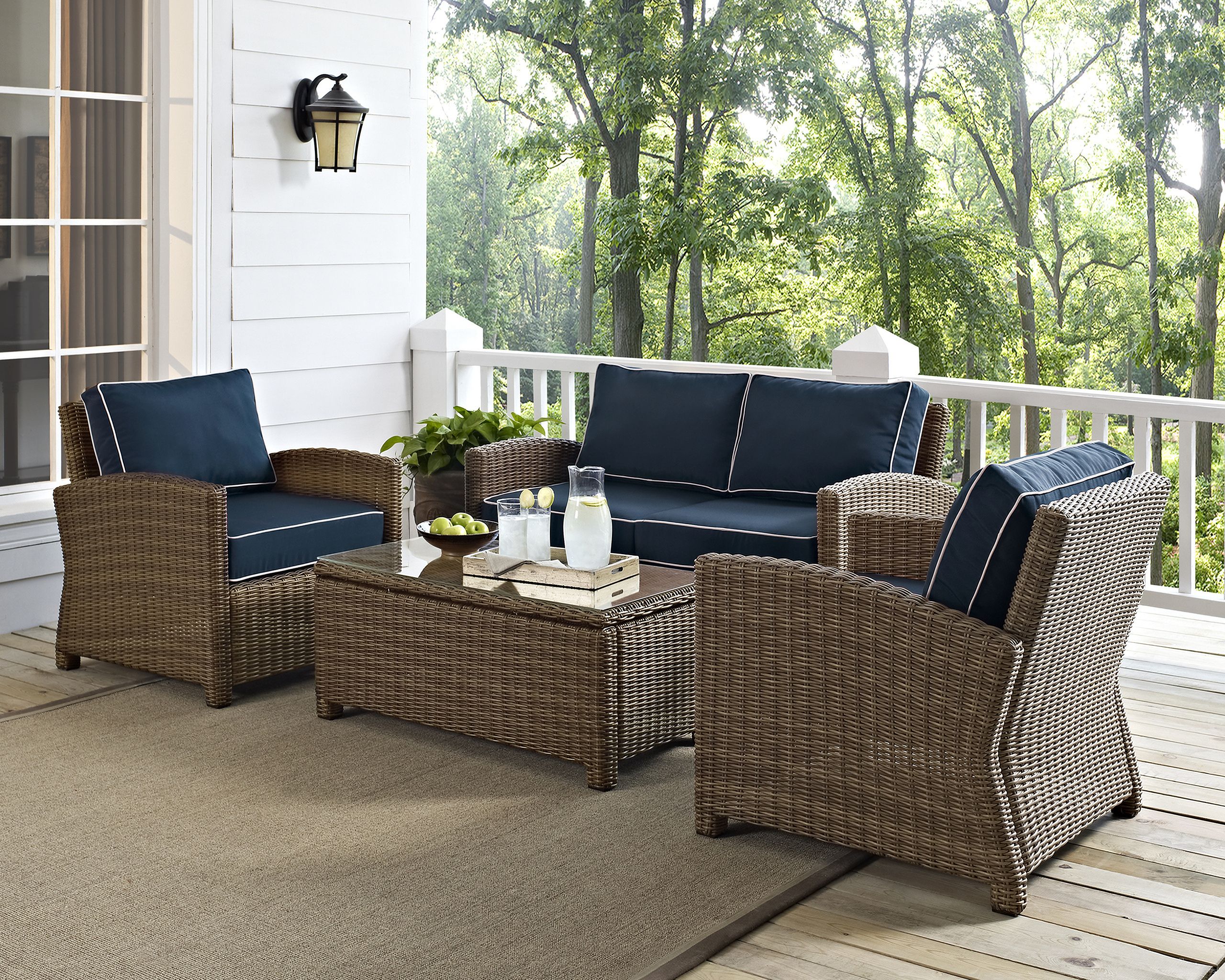 The appearance of Bradenton 4 Piece Wicker Outdoor Loveseat Patio Furniture Set In Navy and Weathered Brown designed by Crosley Brands in the traditional interior design. This navy piece of furniture  was selected by 1StopBedrooms from Bradenton Collection to add a touch of cosiness and style into your home. Sku: CO7115-WB;CO7116-WB;CO7116-WB;CO7208-WB;MO7496-NV. Material: Steel.