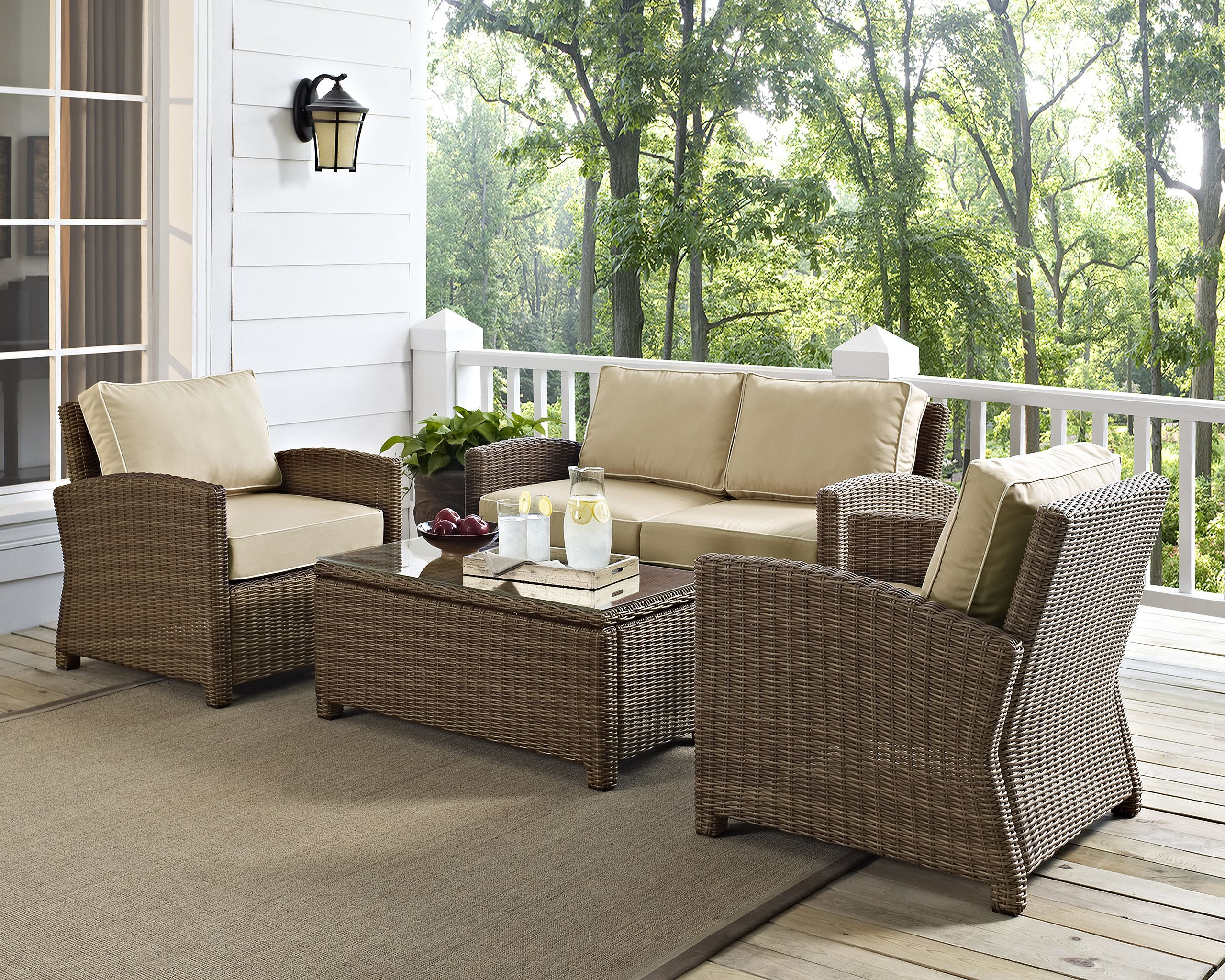 The appearance of Bradenton 4 Piece Wicker Outdoor Loveseat Patio Furniture Set In Sand and Weathered Brown designed by Crosley Brands in the traditional interior design. This sand piece of furniture was selected by 1StopBedrooms from Bradenton Collection to add a touch of cosiness and style into your home. Sku: CO7115-WB;CO7116-WB;CO7116-WB;CO7208-WB;MO7496-SA. Material: Steel.