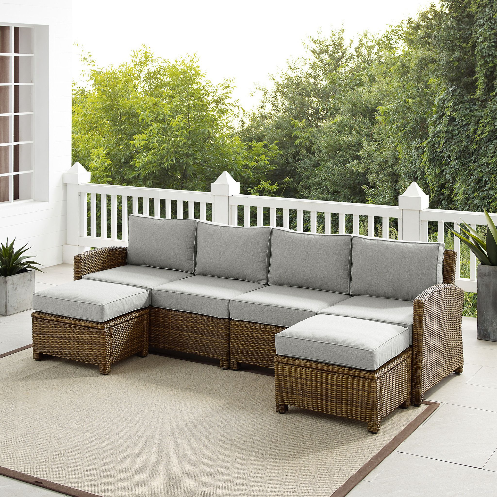 The appearance of Bradenton 4 Piece Wicker Outdoor Sectional Patio Furniture Set In Gray and Weathered Brown designed by Crosley Brands in the traditional interior design. This gray piece of furniture was selected by 1StopBedrooms from Bradenton Collection to add a touch of cosiness and style into your home. Sku: CO7111-WB;CO7112-WB;CO7126-WB;CO7126-WB;MO74995-GY. Material: Polyester.