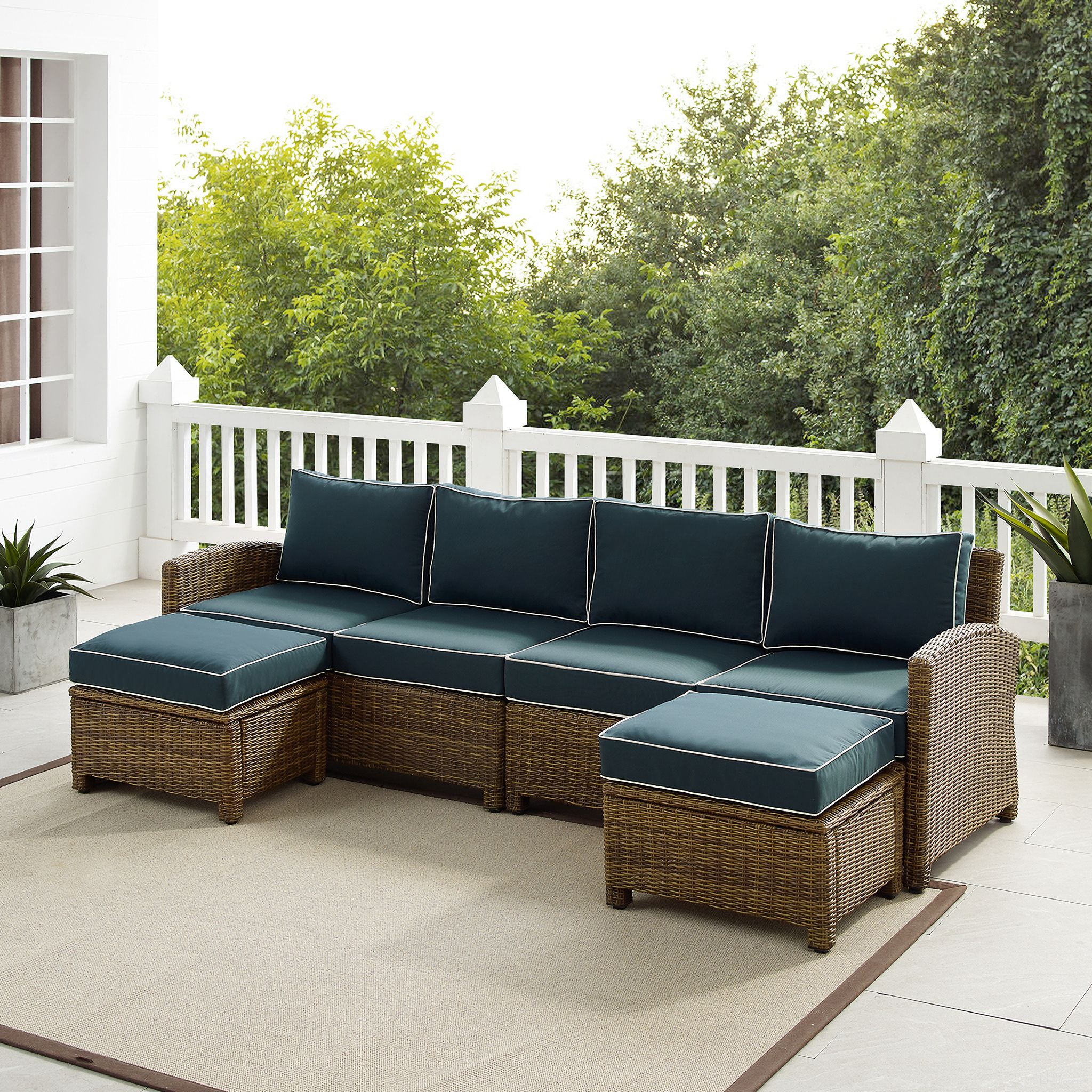 The appearance of Bradenton 4 Piece Wicker Outdoor Sectional Patio Furniture Set In Navy and Weathered Brown designed by Crosley Brands in the traditional interior design. This navy piece of furniture was selected by 1StopBedrooms from Bradenton Collection to add a touch of cosiness and style into your home. Sku: CO7112-WB;CO7111-WB;CO7126-WB;CO7126-WB;MO74995-NV. Material: Polyester.