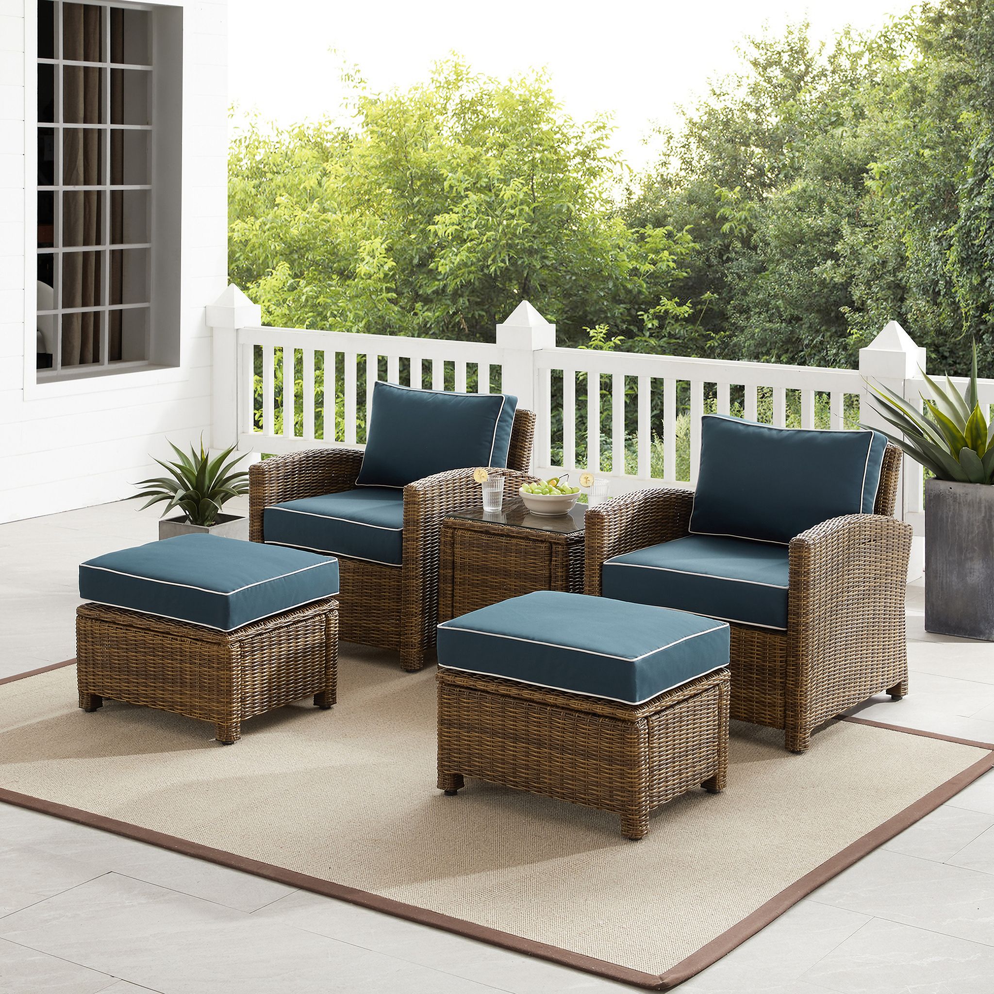 The appearance of Bradenton 5 Piece Wicker Outdoor Chair Set In Navy and Weathered Brown designed by Crosley Brands in the traditional interior design. This navy piece of furniture  was selected by 1StopBedrooms from Bradenton Collection to add a touch of cosiness and style into your home. Sku: CO7116-WB;CO7116-WB;CO7126-WB;CO7126-WB;CO7219-WB;MO74992-NV. Material: Polyester.
