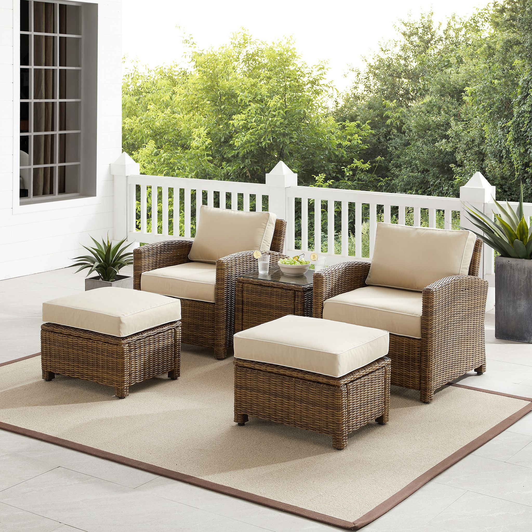 The appearance of Bradenton 5 Piece Wicker Outdoor Chair Set In Sand and Weathered Brown designed by Crosley Brands in the traditional interior design. This sand piece of furniture was selected by 1StopBedrooms from Bradenton Collection to add a touch of cosiness and style into your home. Sku: CO7116-WB;CO7116-WB;CO7126-WB;CO7126-WB;CO7219-WB;MO74992-SA. Material: Polyester.