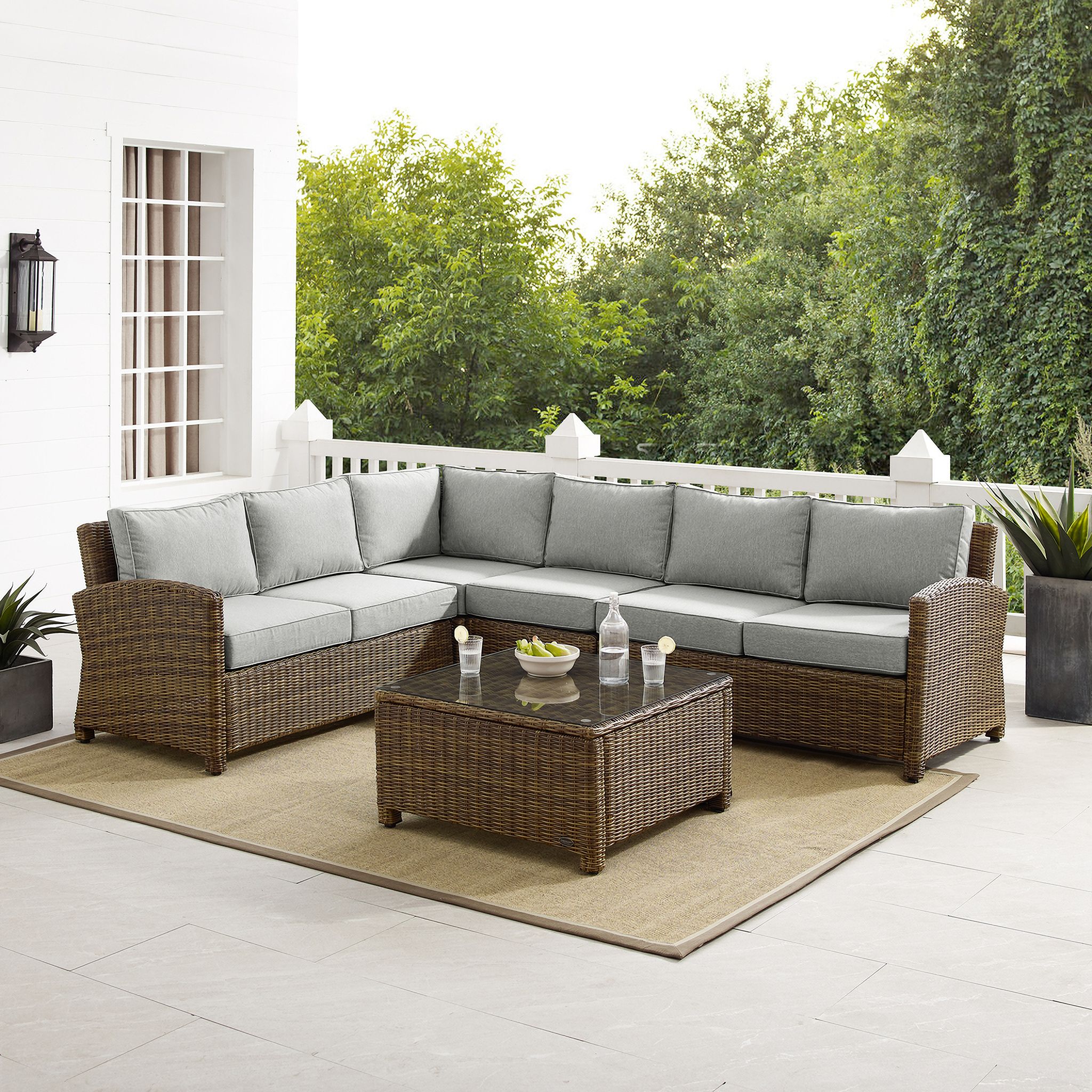 The appearance of Bradenton 5 Piece Wicker Outdoor Sectional Patio Furniture Set In Gray and Weathered Brown designed by Crosley Brands in the traditional interior design. This gray piece of furniture was selected by 1StopBedrooms from Bradenton Collection to add a touch of cosiness and style into your home. Sku: CO7111-WB;CO7112-WB;CO7114-WB;CO7113-WB;CO7207-WB;MO7497-GY. Material: Steel.