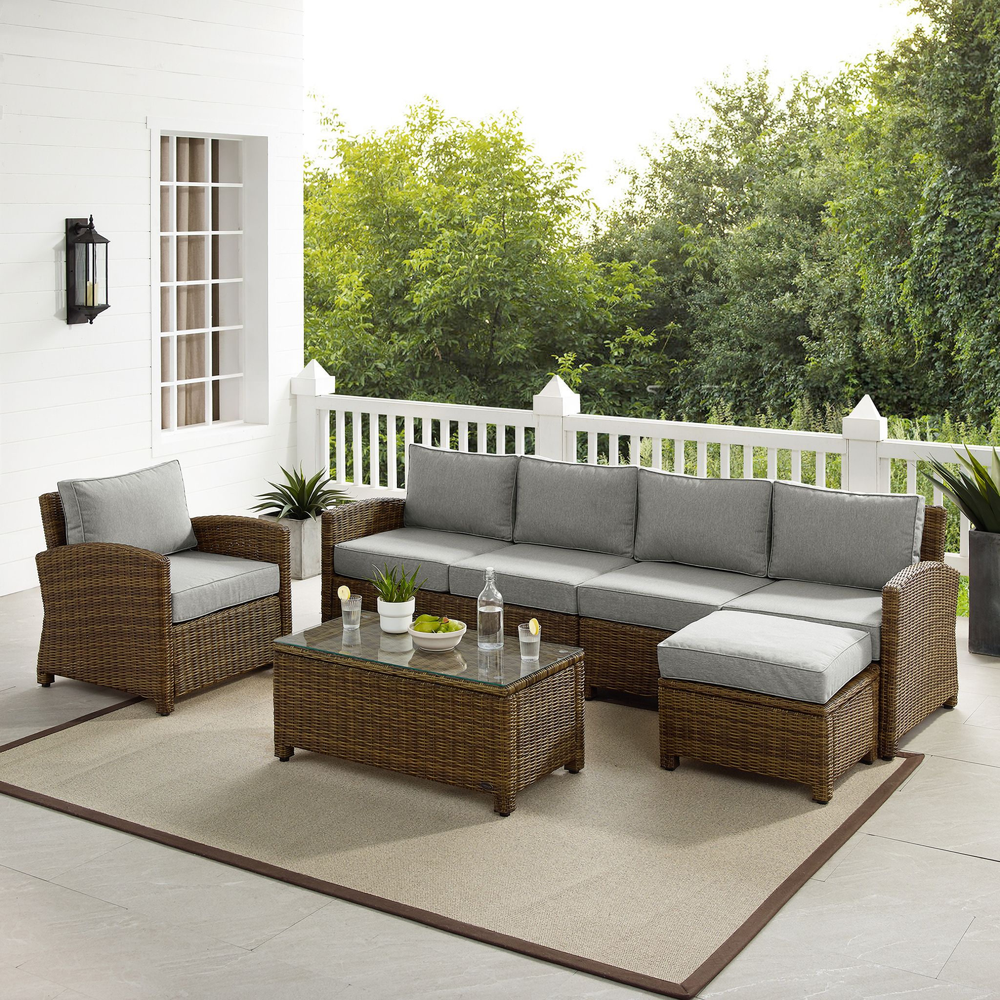 The appearance of Bradenton 5 Piece Wicker Outdoor Sectional Patio Furniture Set In Gray and Weathered Brown designed by Crosley Brands in the traditional interior design. This gray piece of furniture was selected by 1StopBedrooms from Bradenton Collection to add a touch of cosiness and style into your home. Sku: CO7111-WB;CO7112-WB;CO7116-WB;CO7126-WB;CO7208-WB;MO74996-GY. Material: Steel.