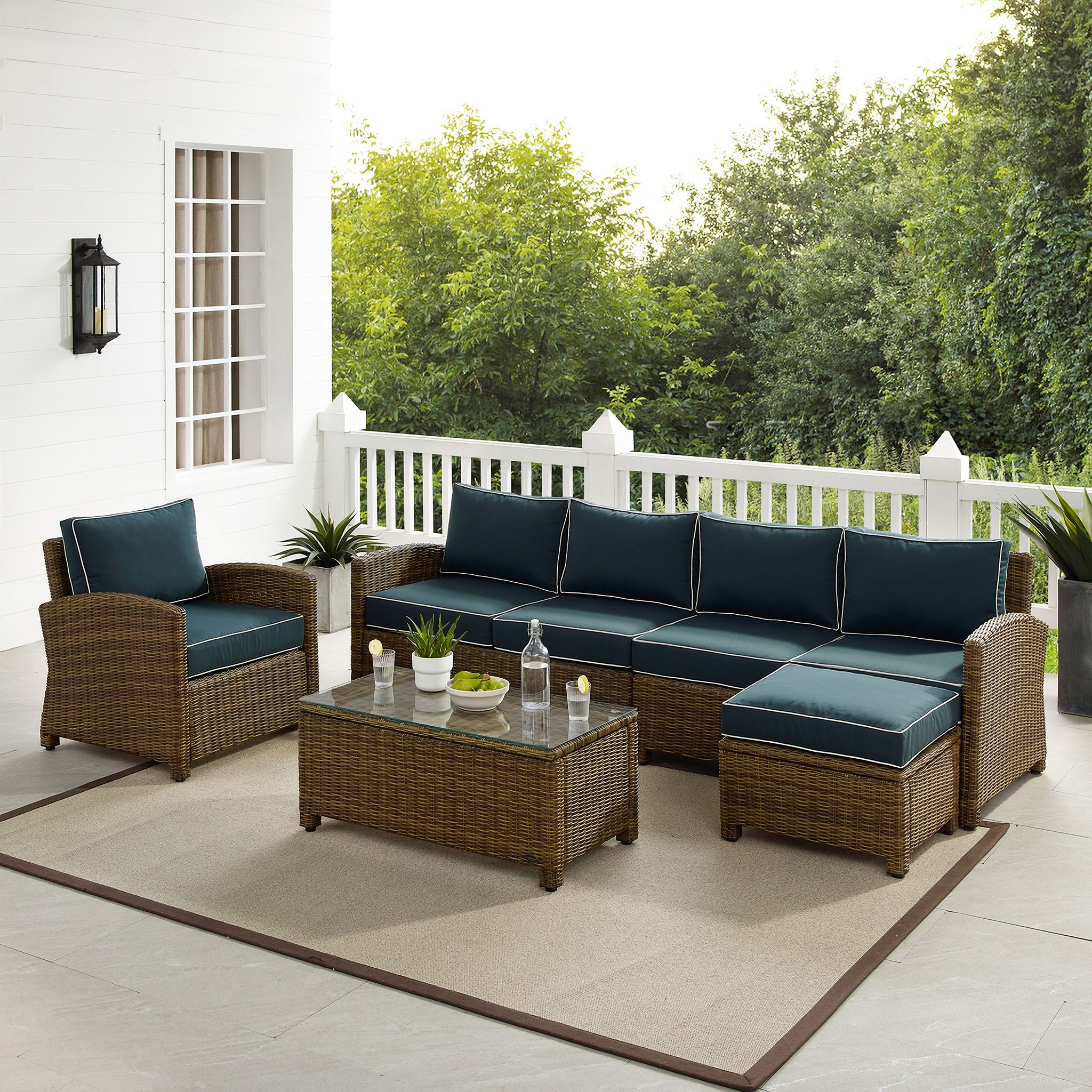 The appearance of Bradenton 5 Piece Wicker Outdoor Sectional Patio Furniture Set In Navy and Weathered Brown designed by Crosley Brands in the traditional interior design. This navy piece of furniture was selected by 1StopBedrooms from Bradenton Collection to add a touch of cosiness and style into your home. Sku: CO7112-WB;CO7111-WB;CO7116-WB;CO7126-WB;CO7208-WB;MO74996-NV. Material: Steel.
