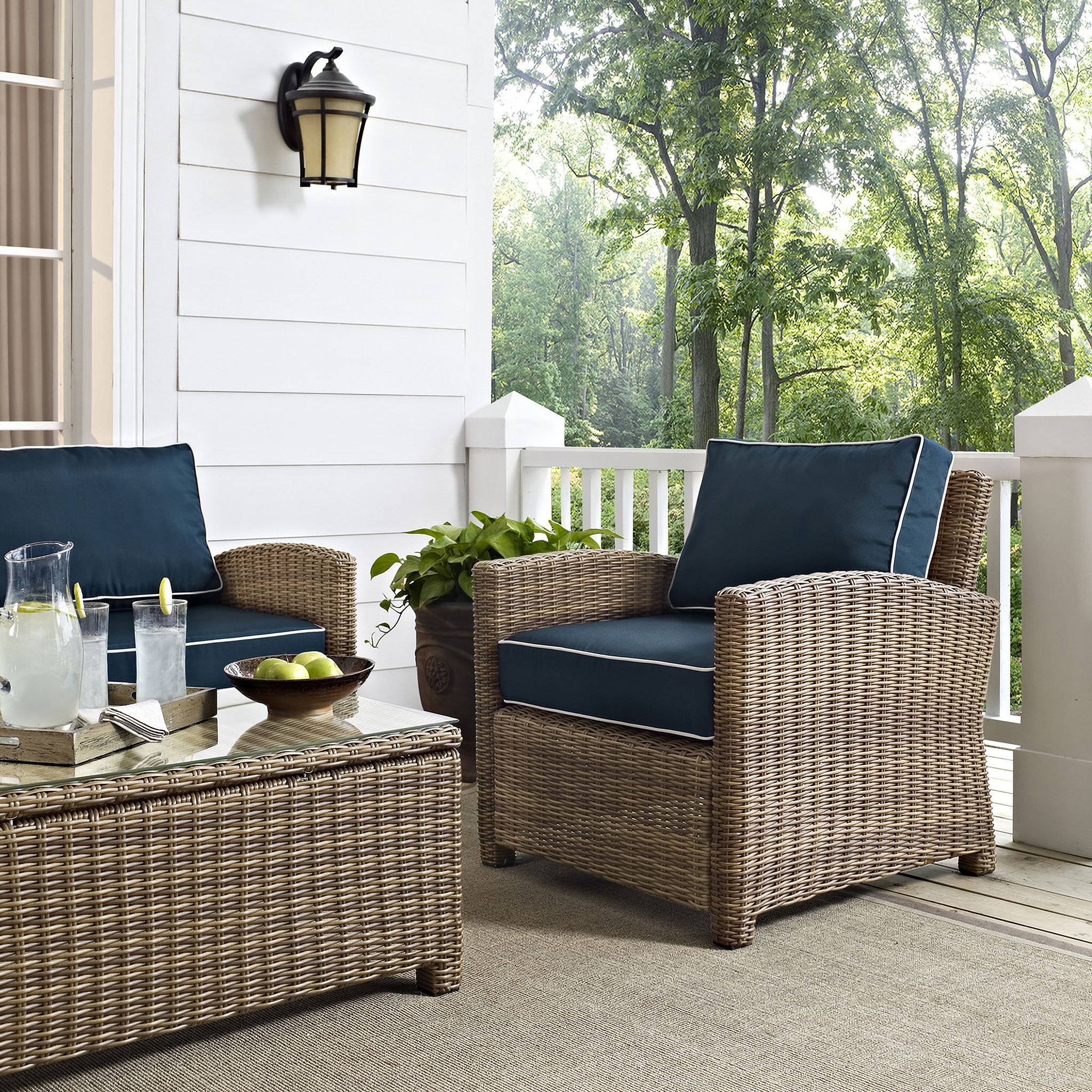The appearance of Bradenton Wicker Outdoor Chair In Navy and Weathered Brown designed by Crosley Brands in the traditional interior design. This navy piece of furniture was selected by 1StopBedrooms from Bradenton Collection to add a touch of cosiness and style into your home. Sku: CO7116-WB;CO7401-NV. Material: Polyester.